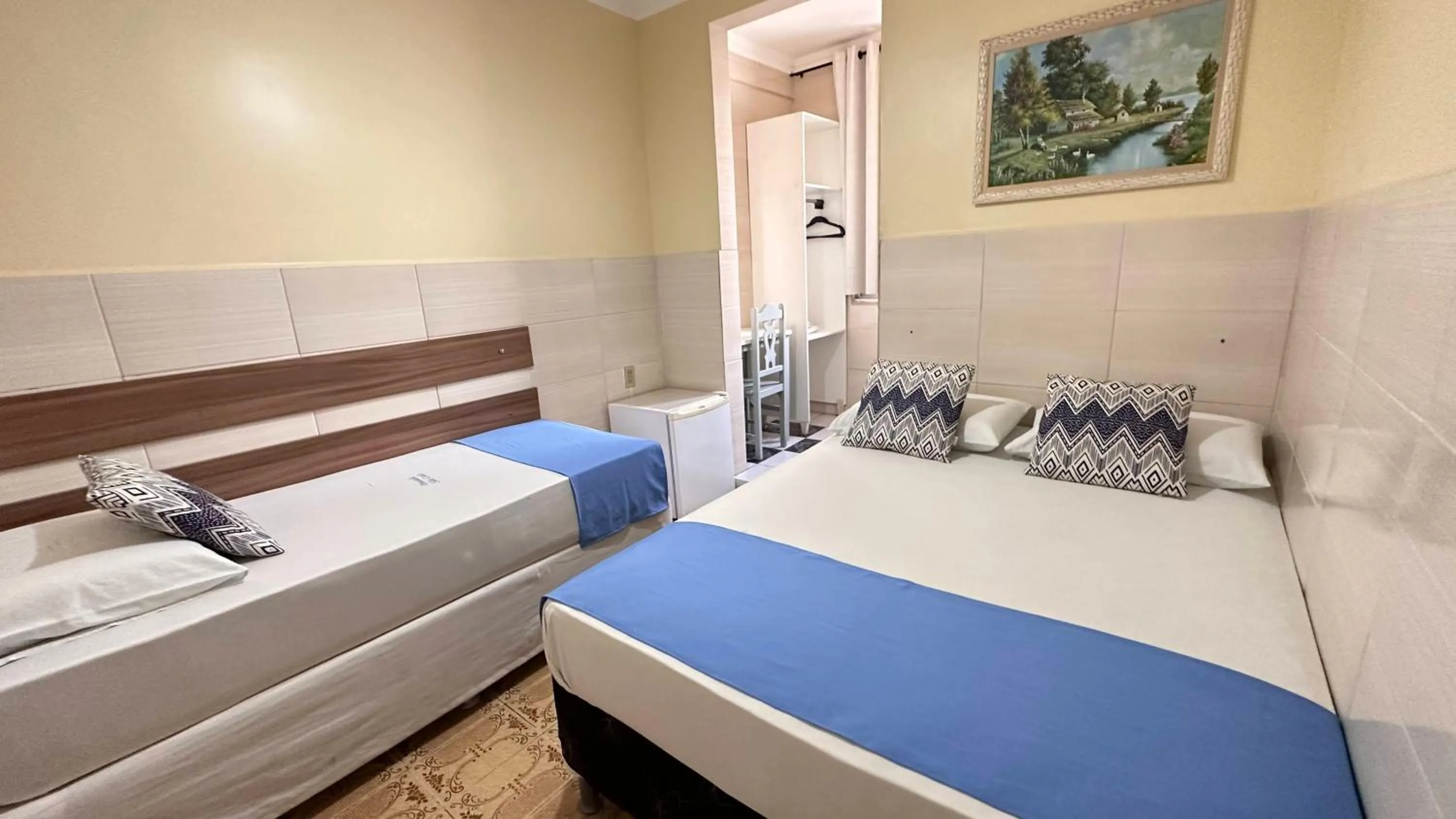 Bed in Pousada São Luiz