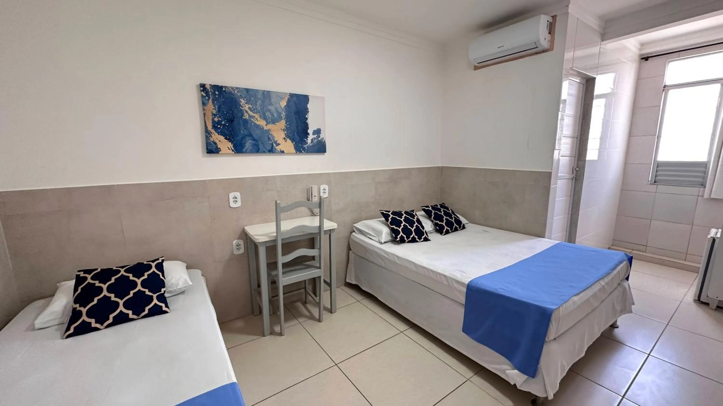 Bed in Pousada São Luiz