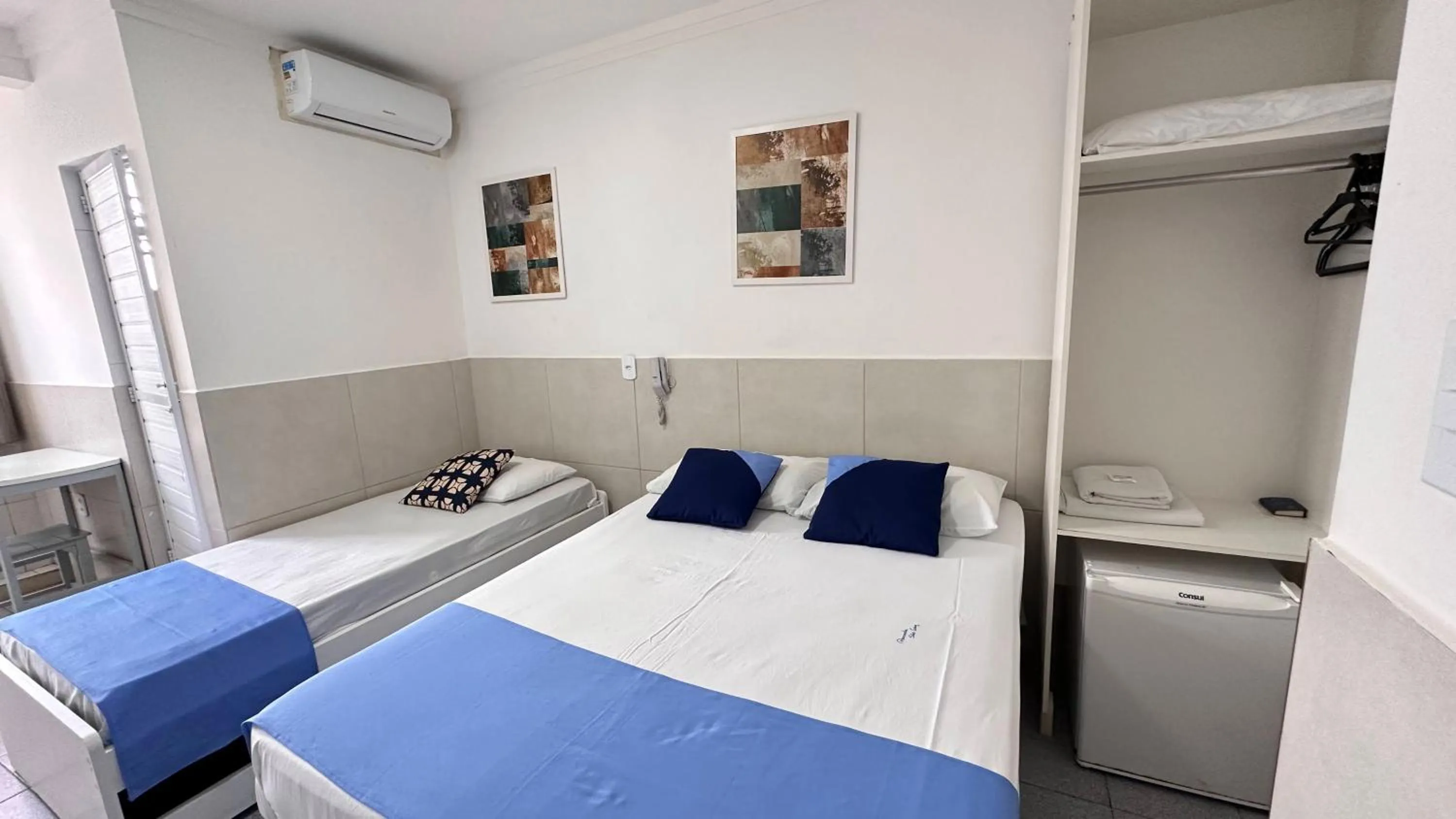 Bed in Pousada São Luiz