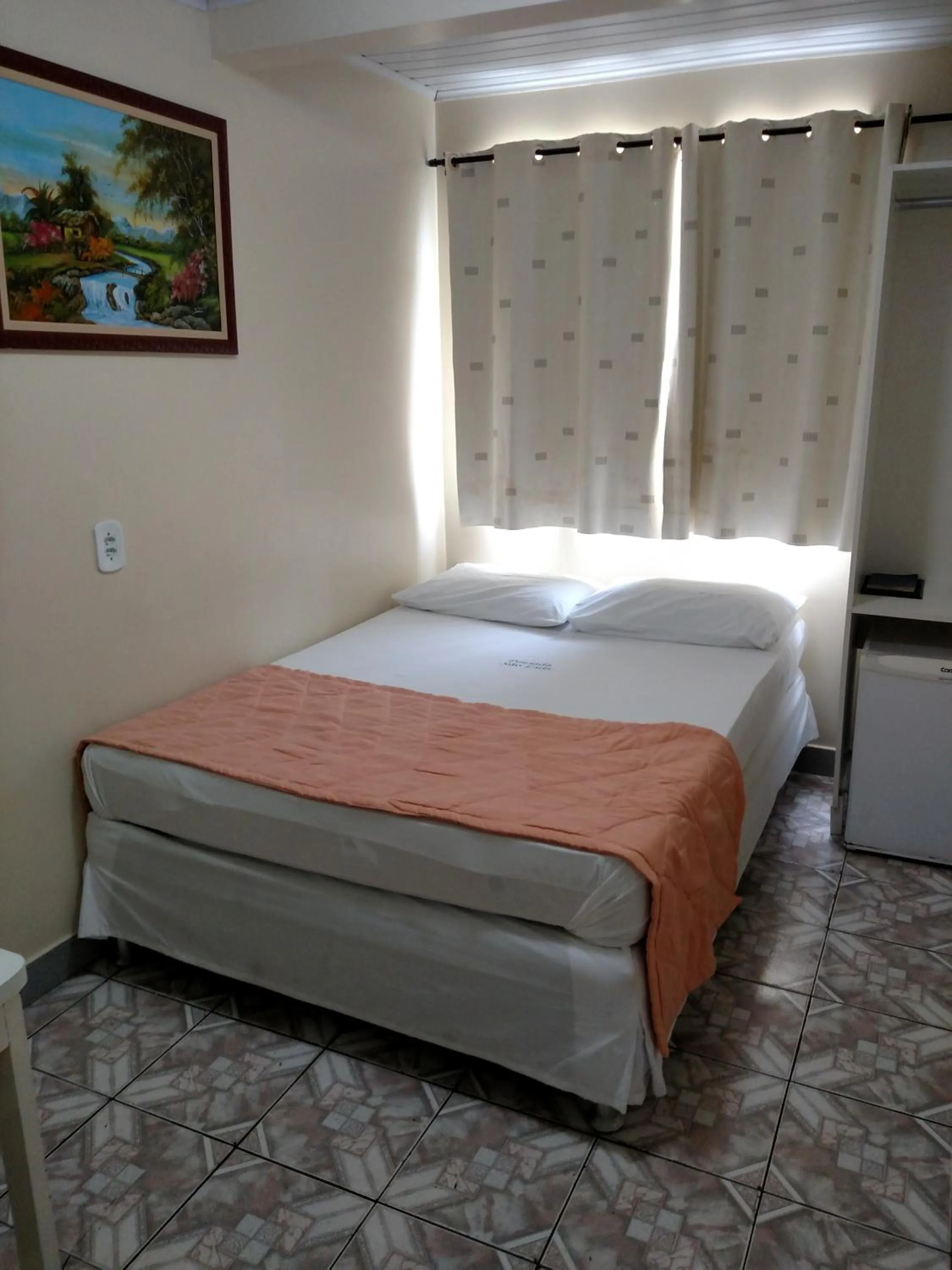 Bed in Pousada São Luiz