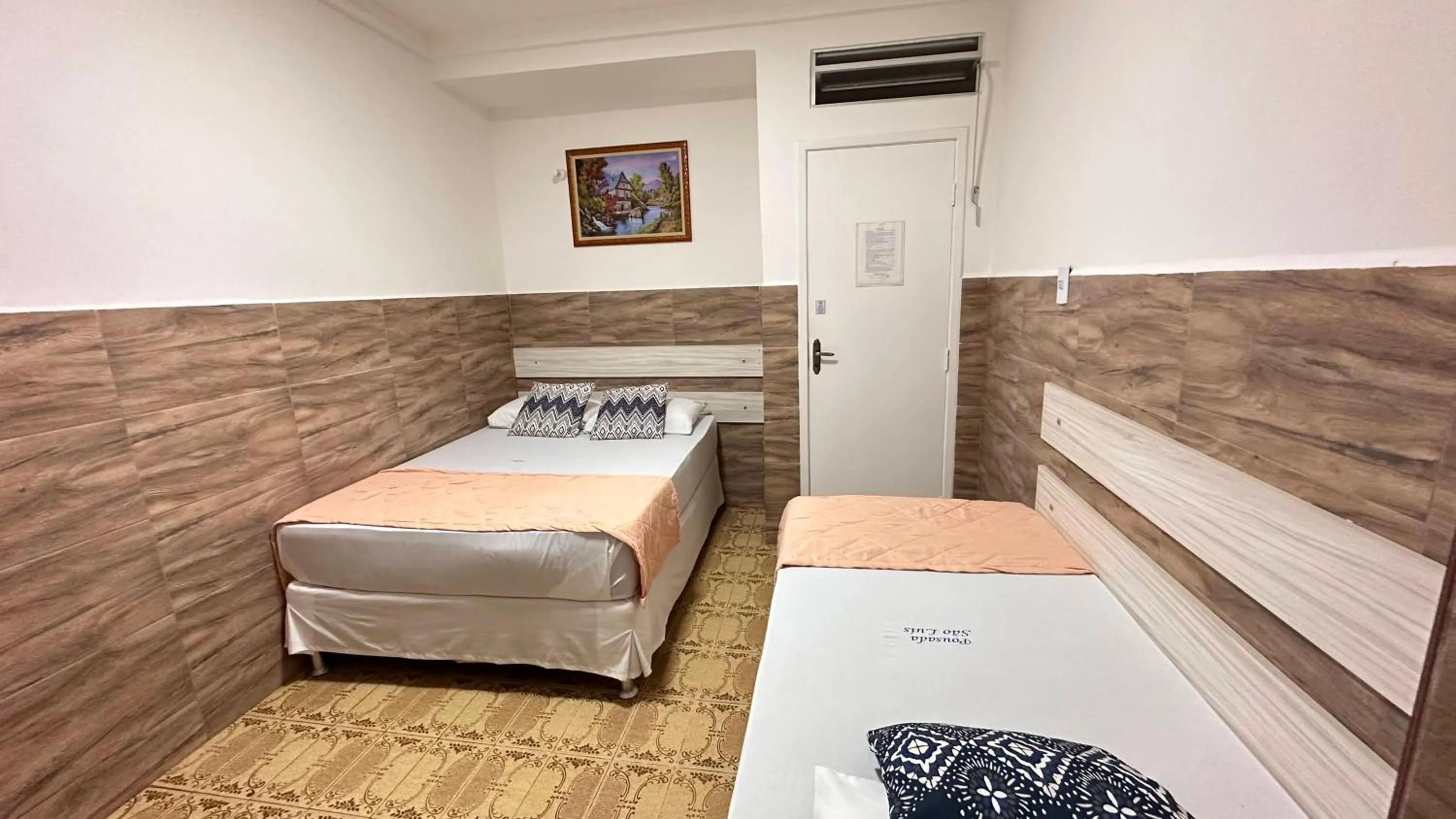 Bed in Pousada São Luiz