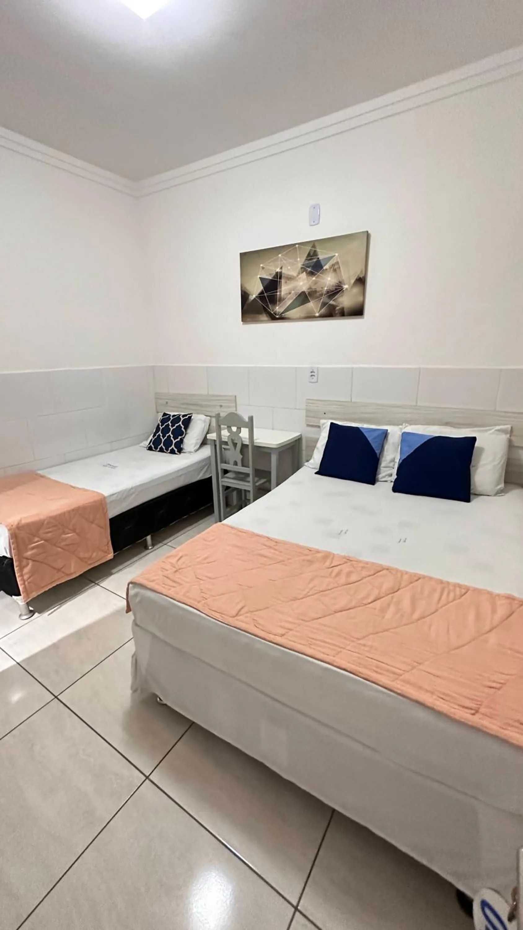 Bed in Pousada São Luiz