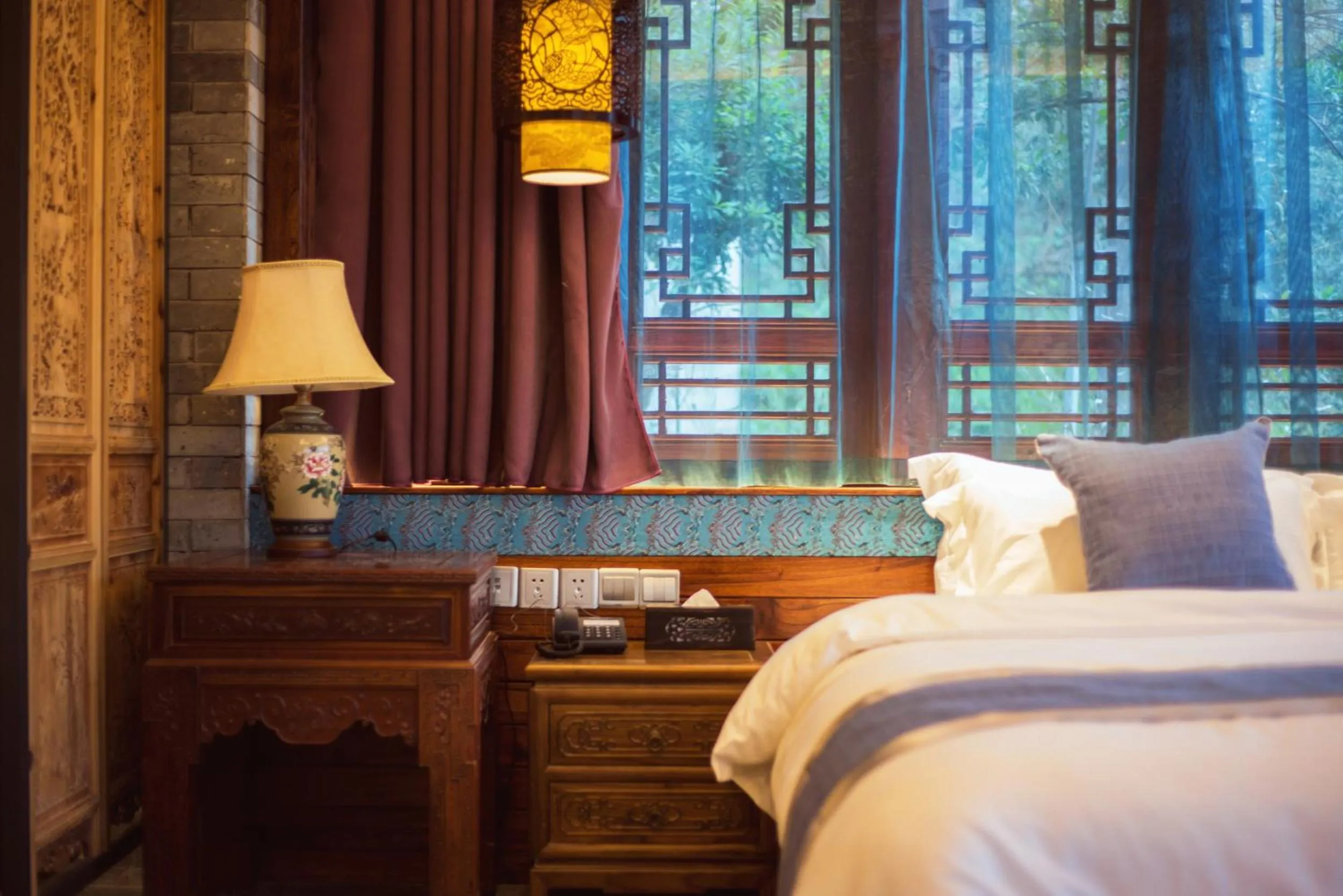 Decorative detail, Bed in Li River Resort