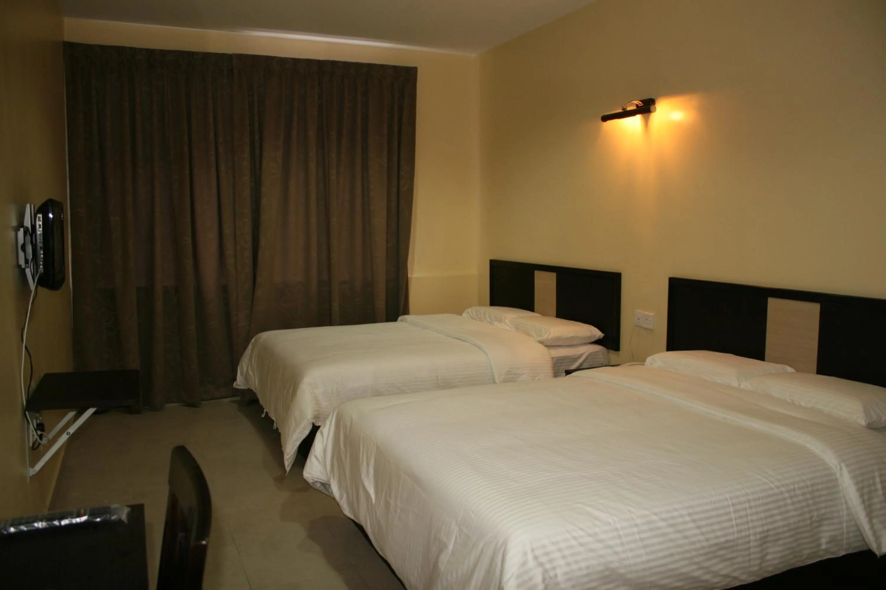 Bed in The Fern Lodge Hotel