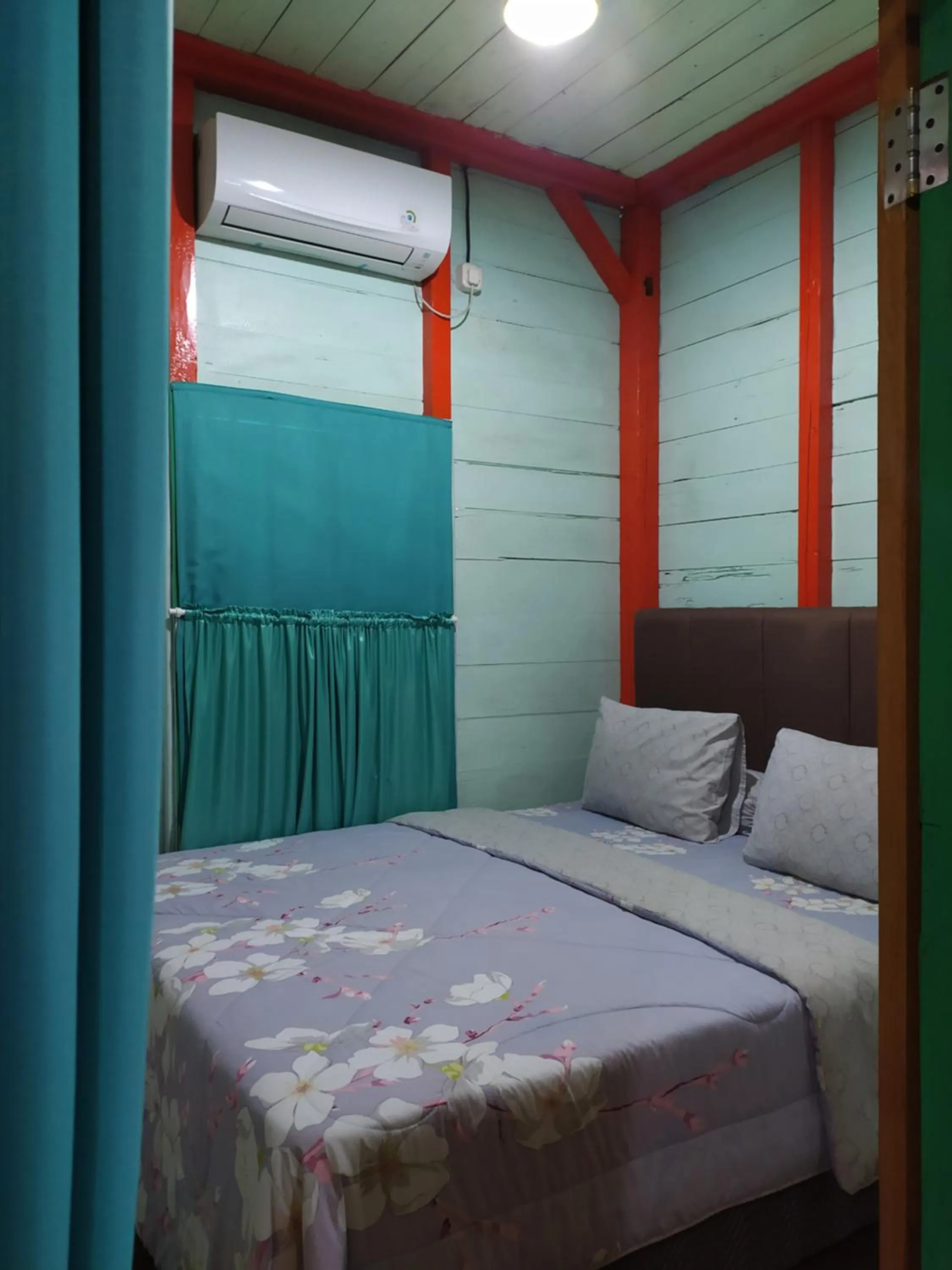 Bed in Rock and Wreck Dive Resort