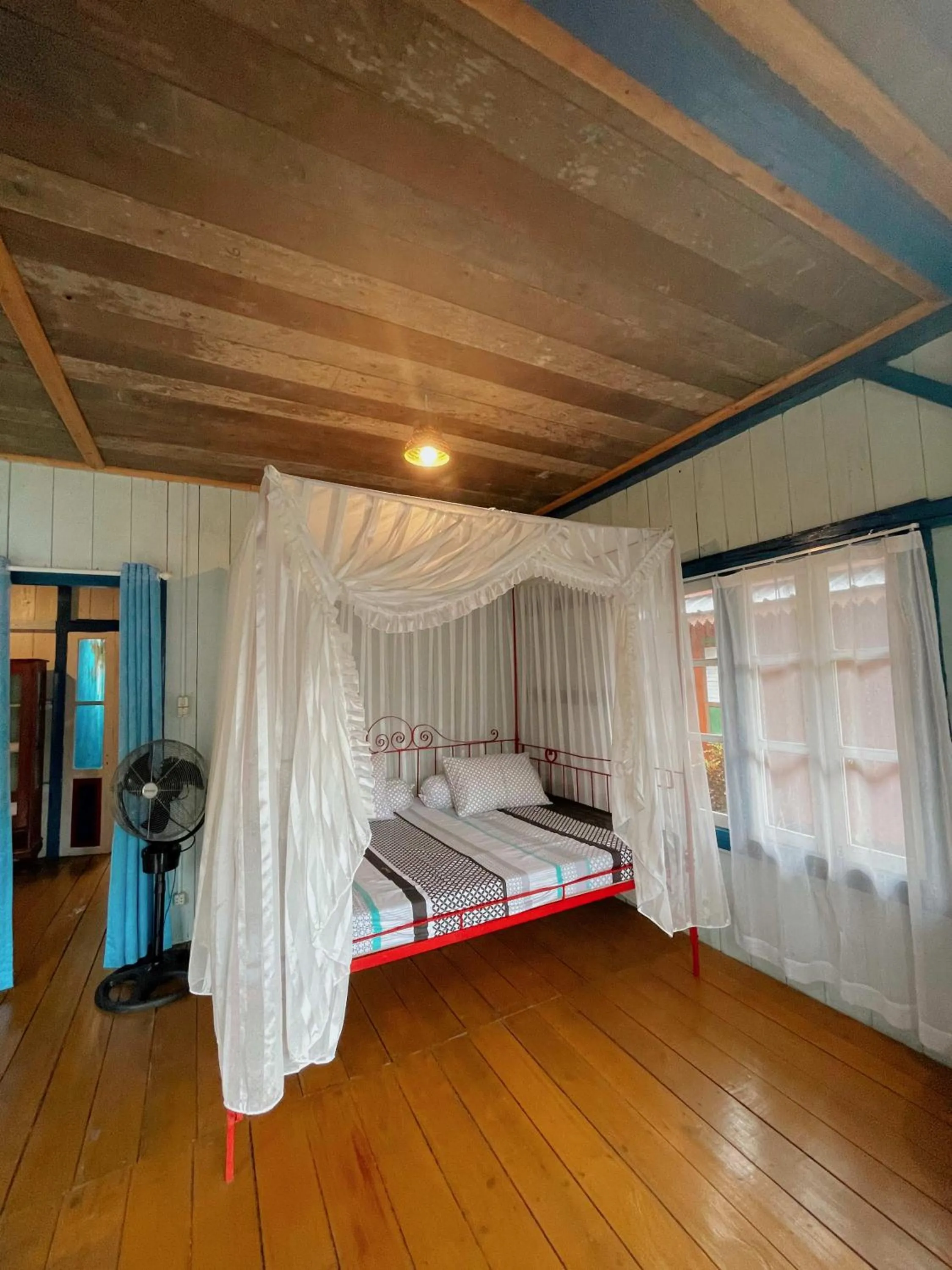 Bed in Rock and Wreck Dive Resort