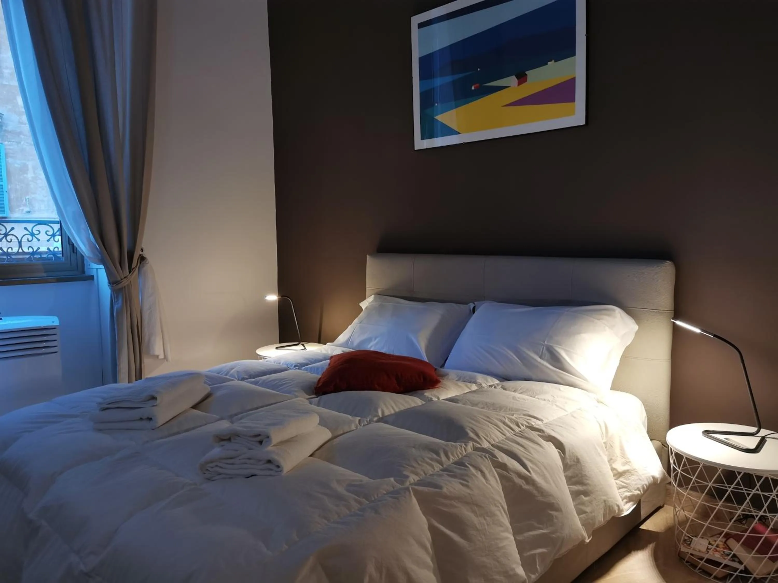 Bed in 109 SUITES ROMA