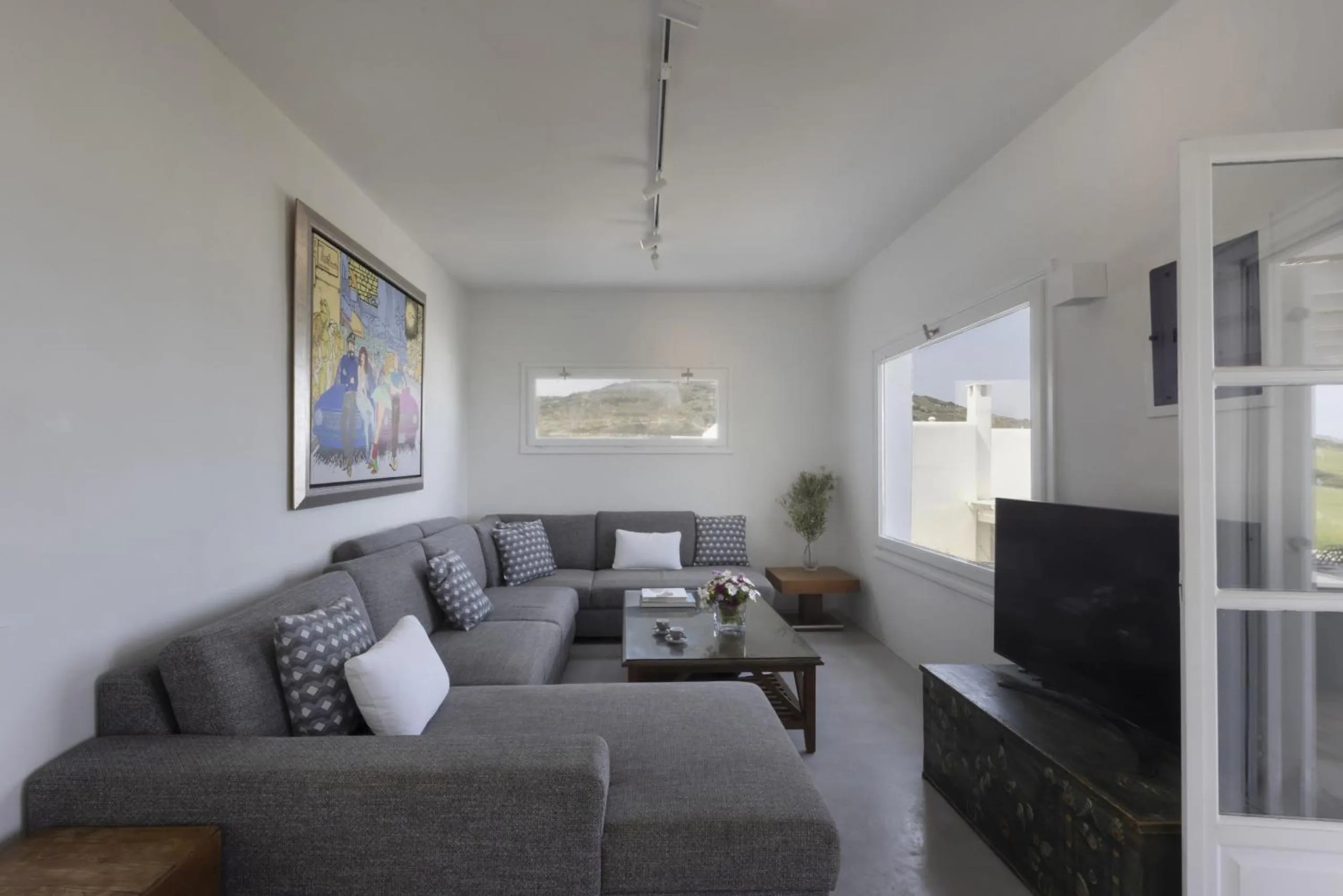 Communal lounge/ TV room in Villa Alkyoni · Beautiful 8-person Family Villa with Great Views