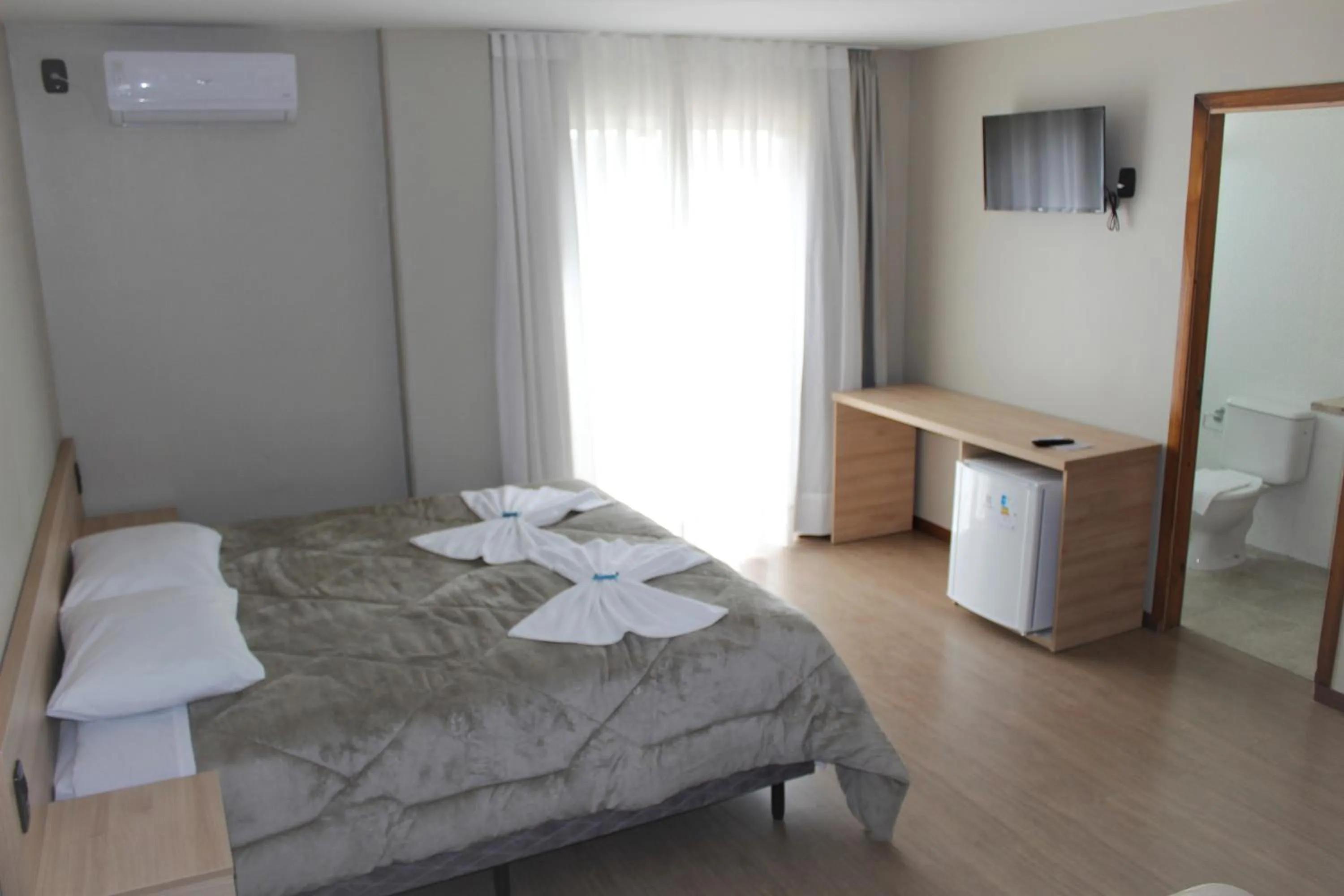 Photo of the whole room, Bed in Pousada Essência Serrana Gramado