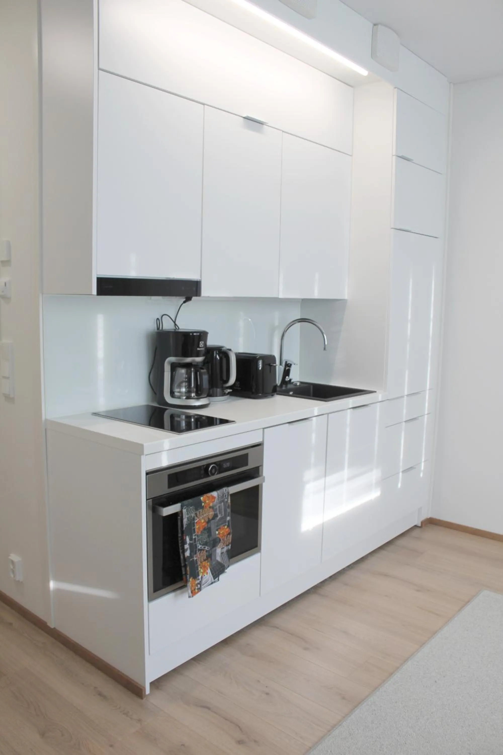 Kitchen or kitchenette in Forenom Serviced Apartments Rovaniemi Valtakatu