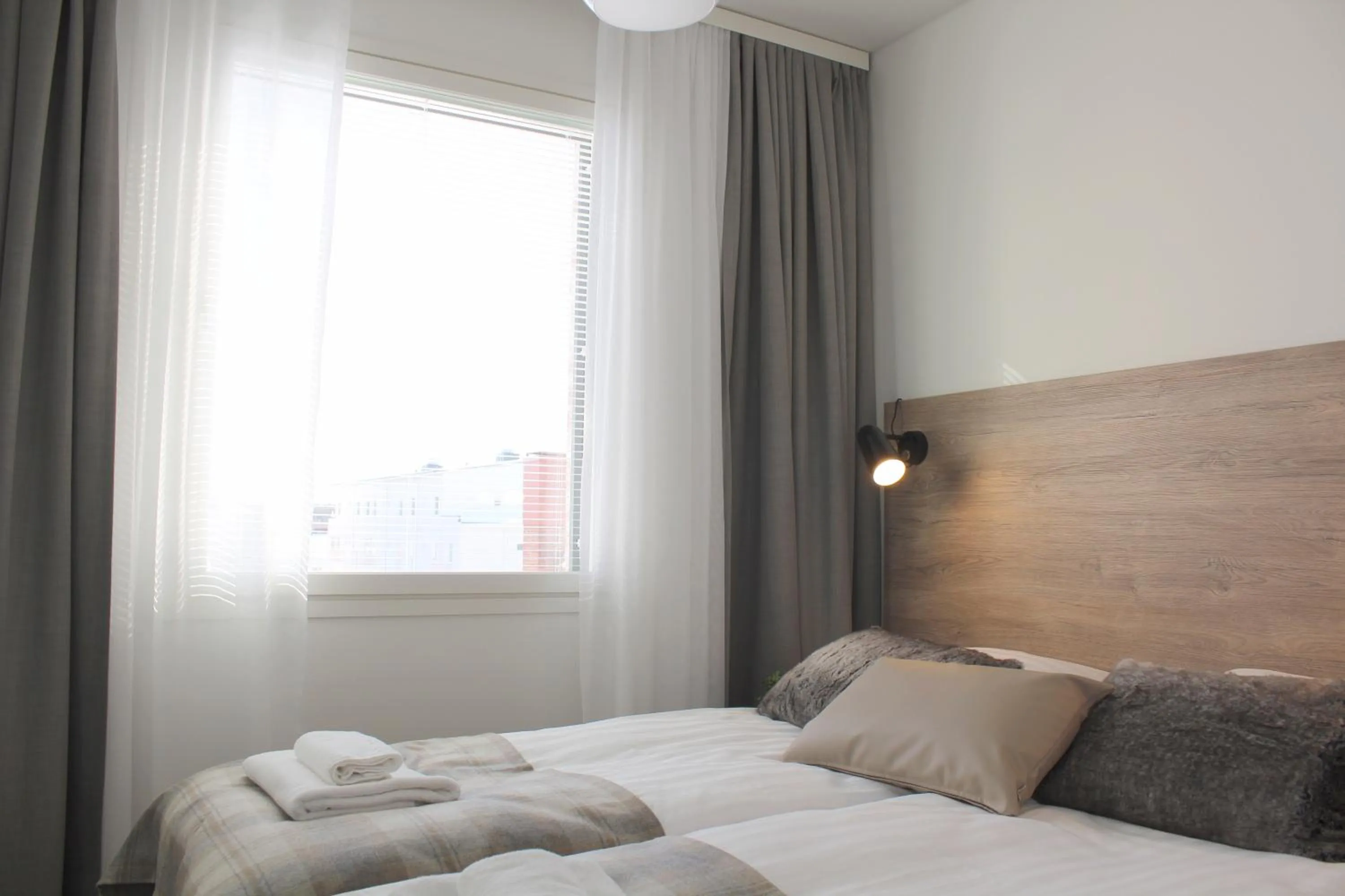 Bed in Forenom Serviced Apartments Rovaniemi Valtakatu