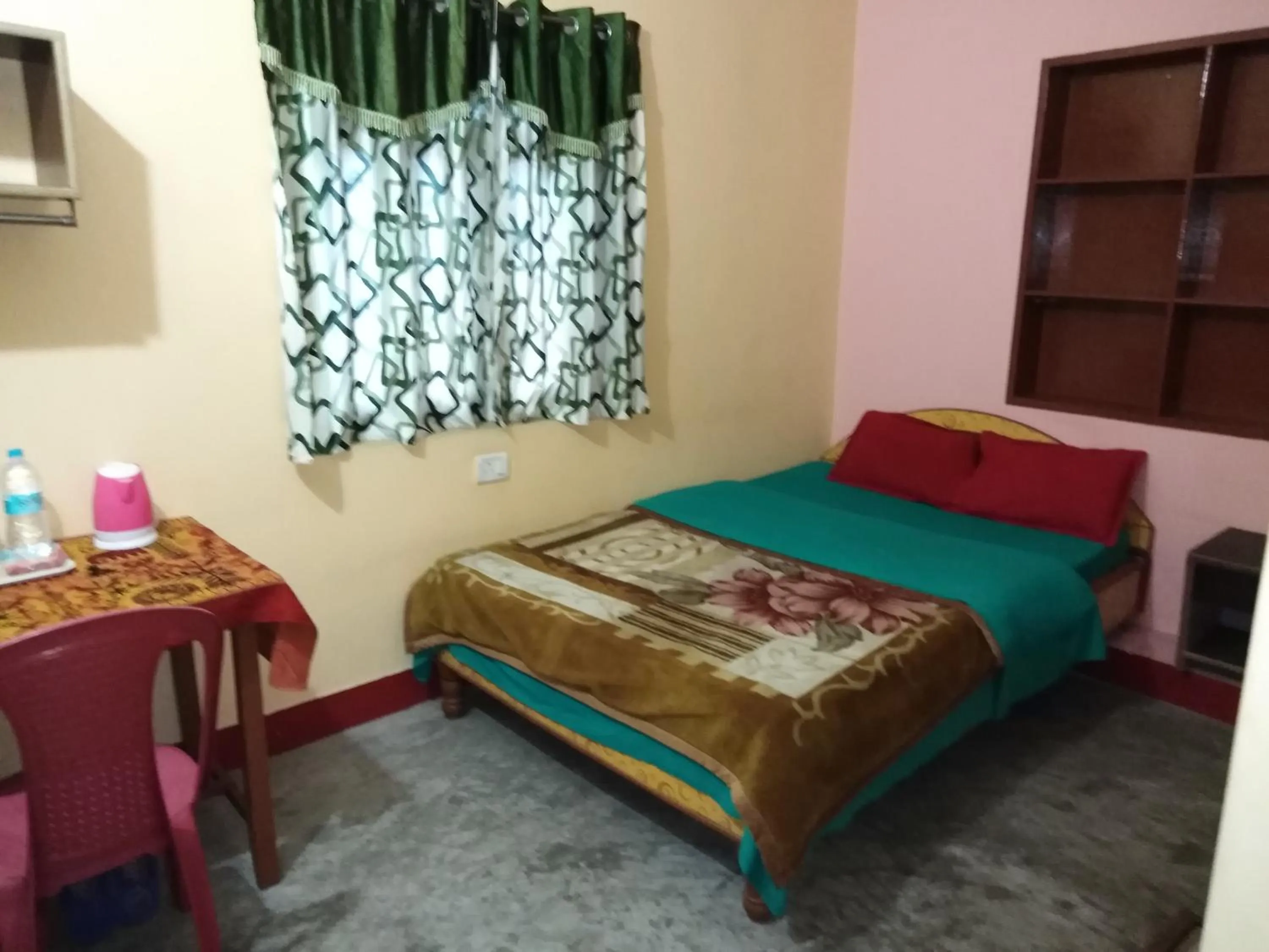 Photo of the whole room, Bed in Kundanbazar Guest House