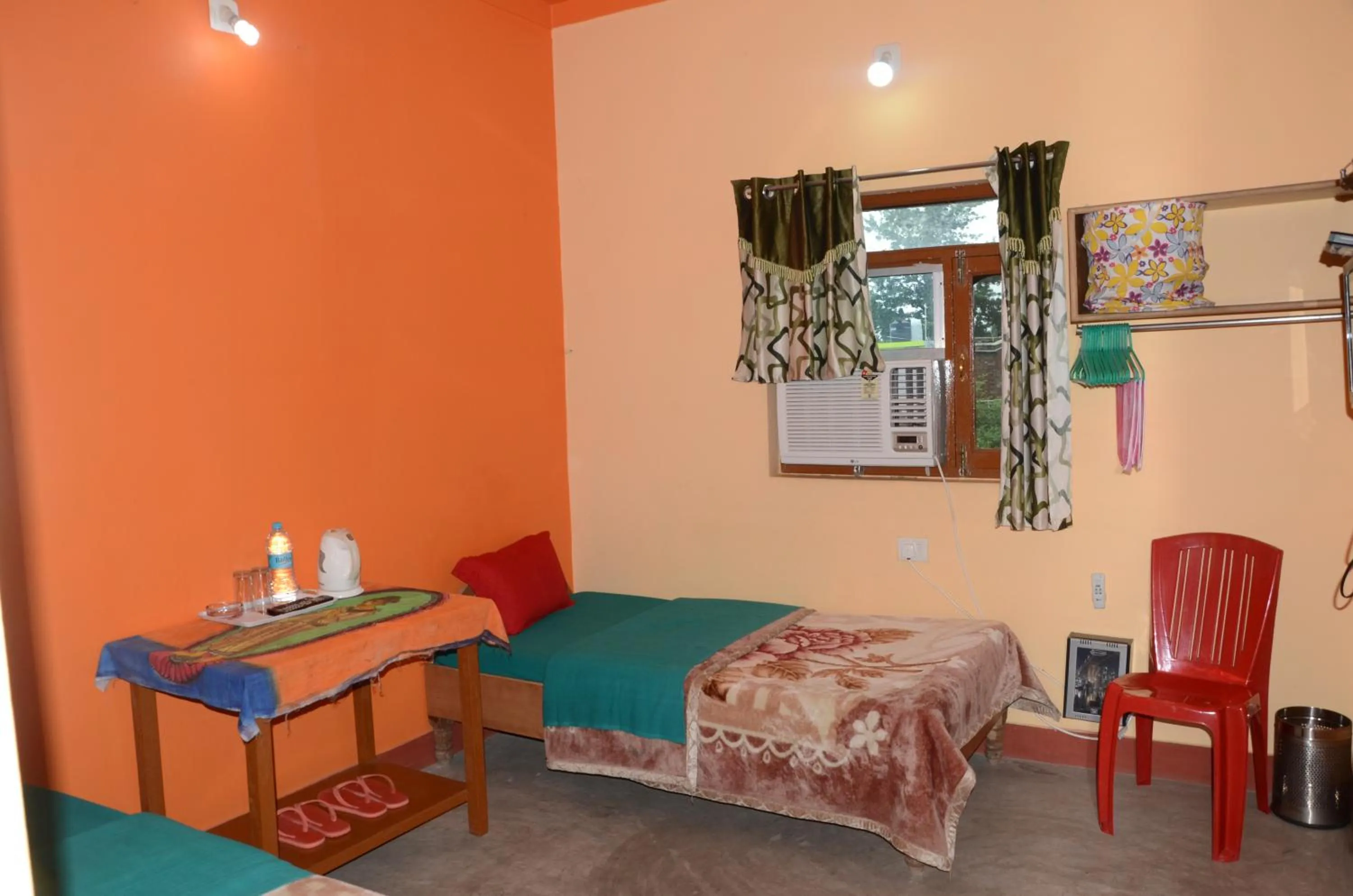 Photo of the whole room, Bed in Kundanbazar Guest House