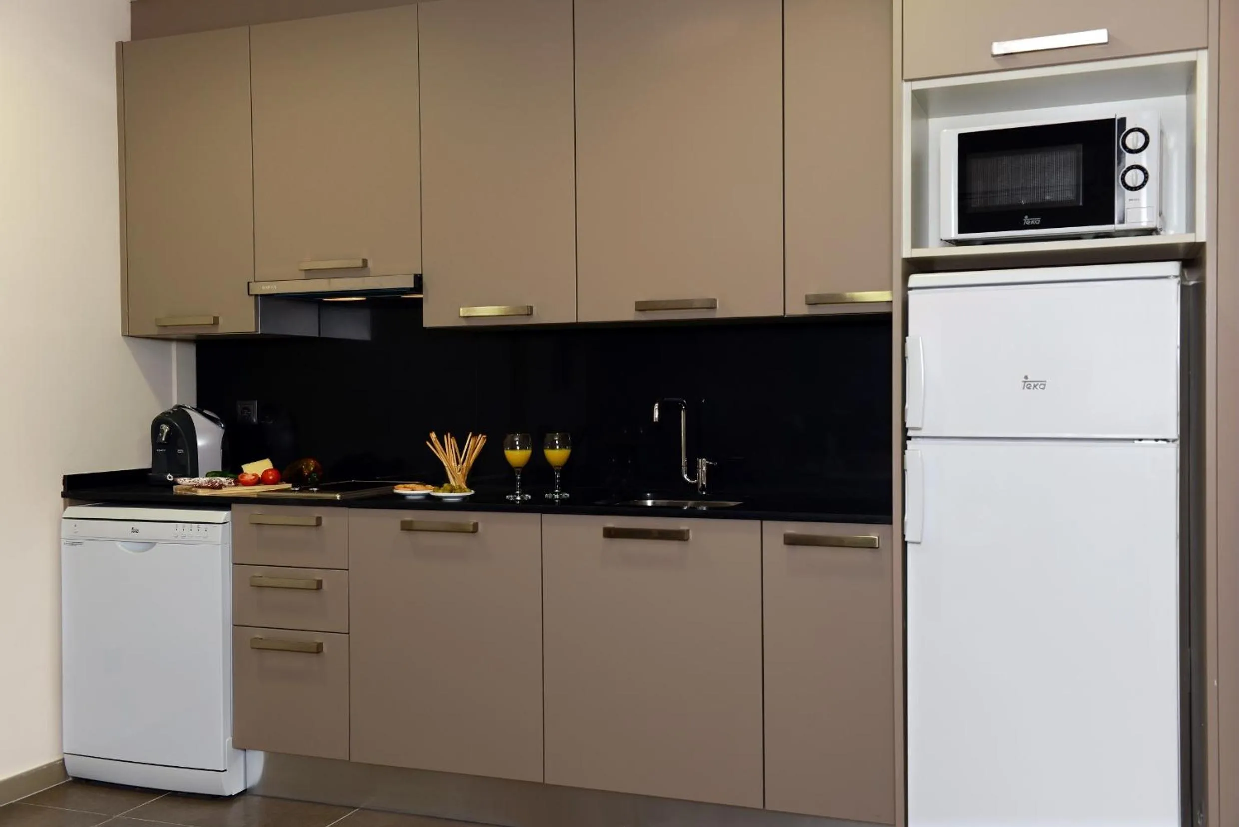 Kitchen or kitchenette in Pierre & Vacances Barcelona Sants