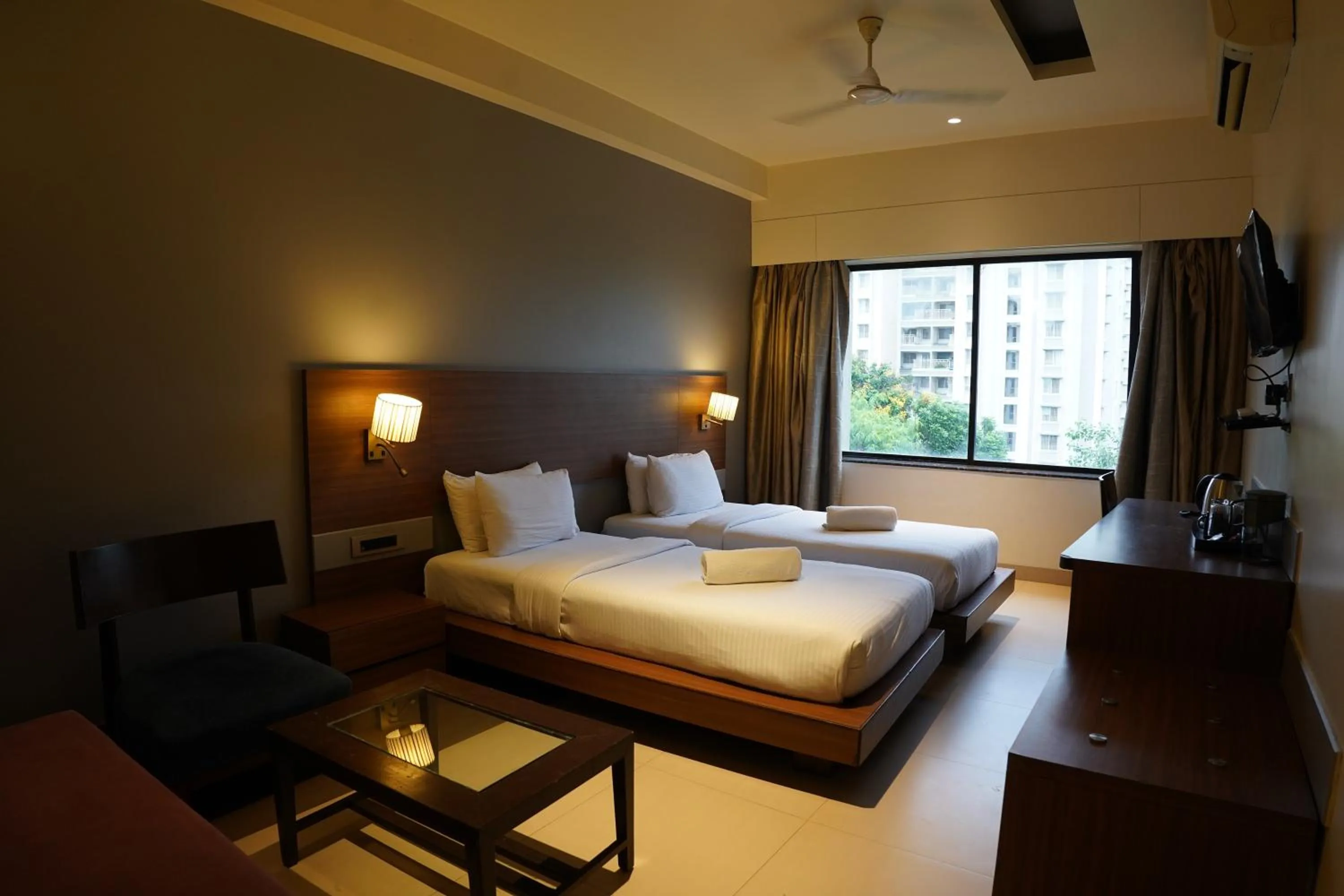Photo of the whole room, Bed in Hotel Sadanand Regency - Newly Renovated
