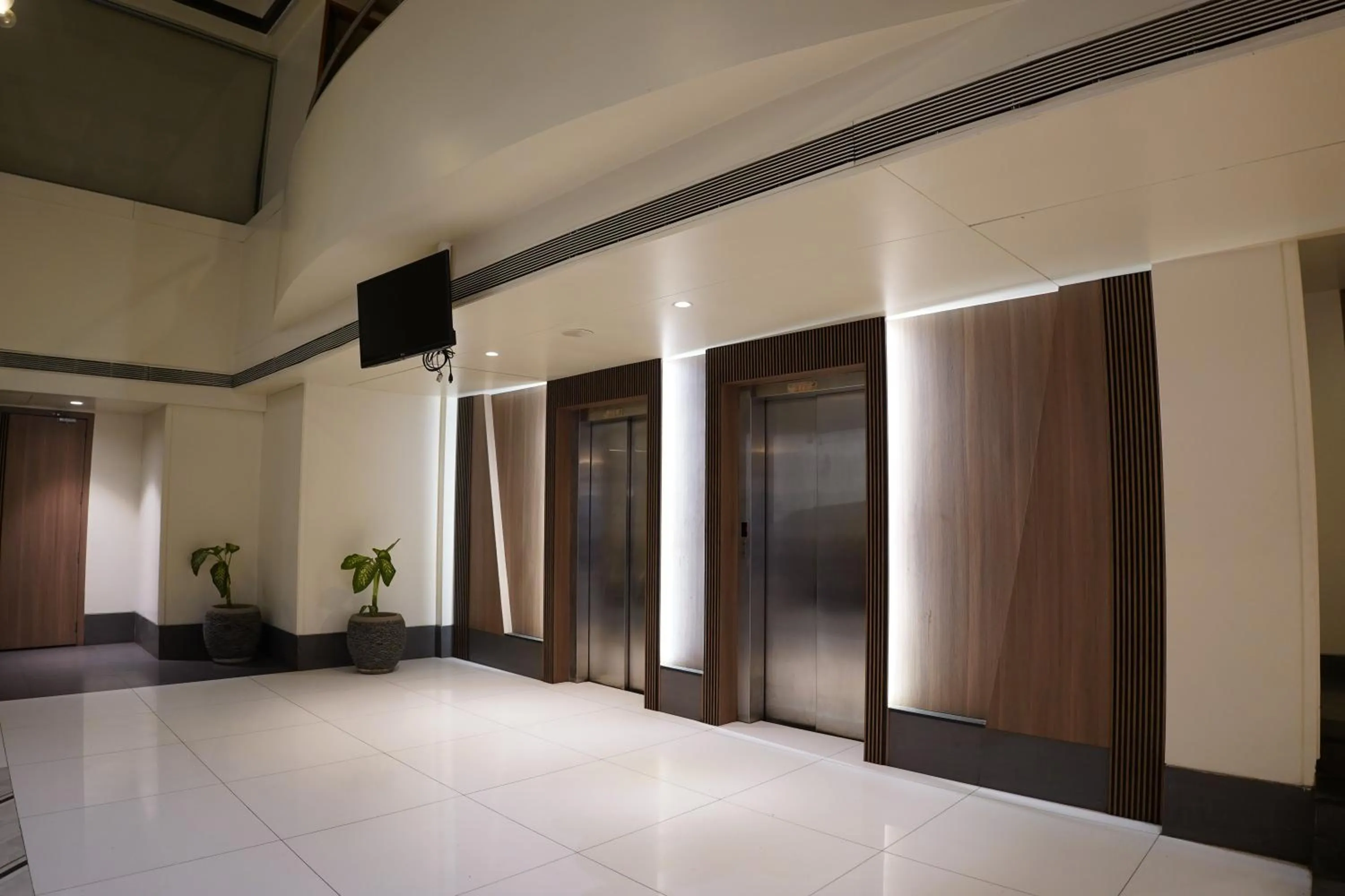 elevator in Hotel Sadanand Regency - Newly Renovated