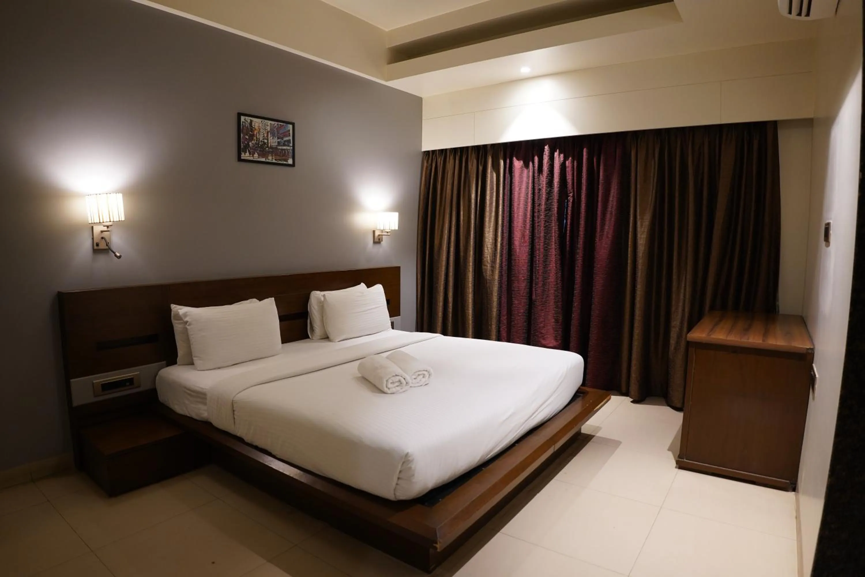 Bedroom, Bed in Hotel Sadanand Regency - Newly Renovated
