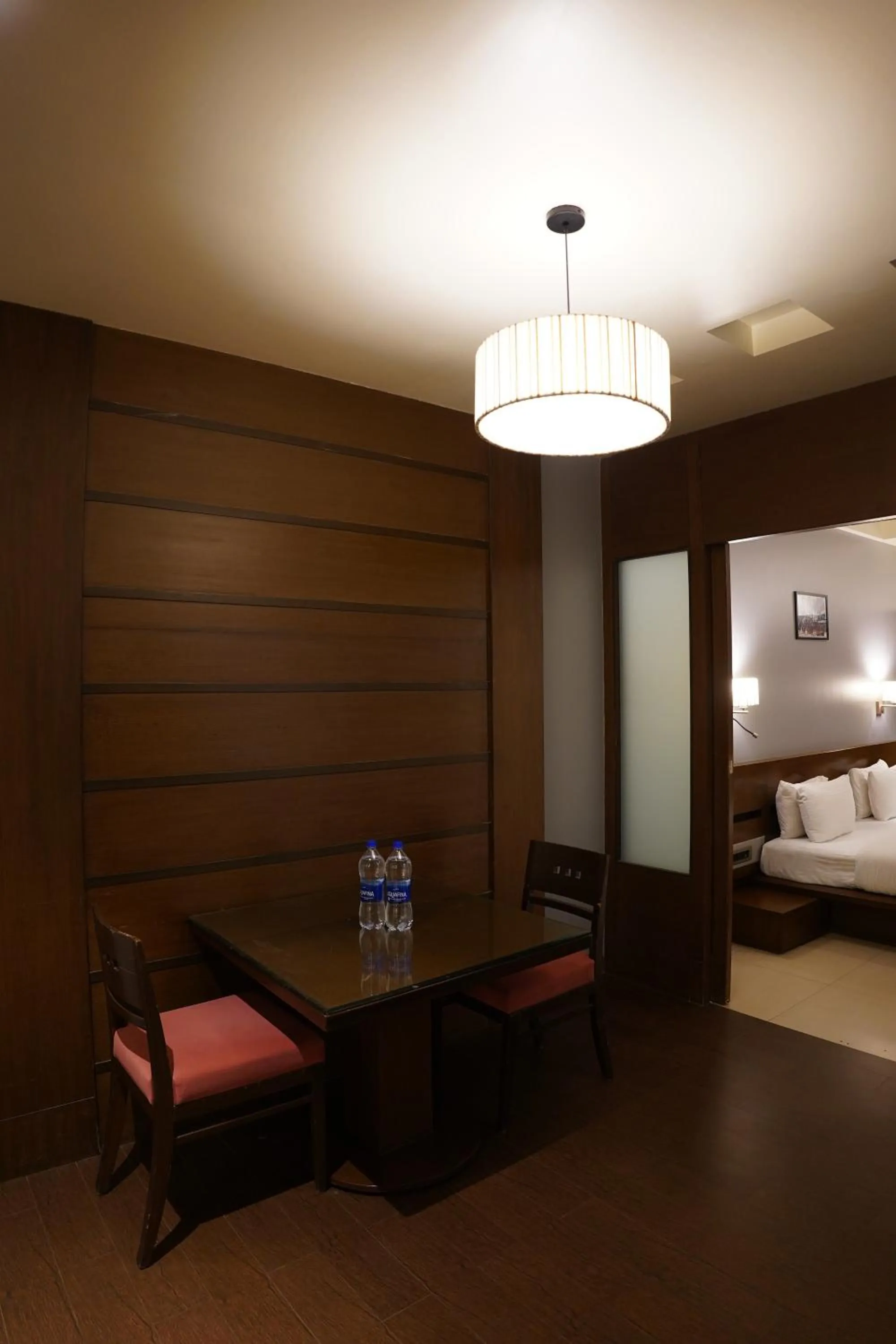 Living room, Bed in Hotel Sadanand Regency - Newly Renovated