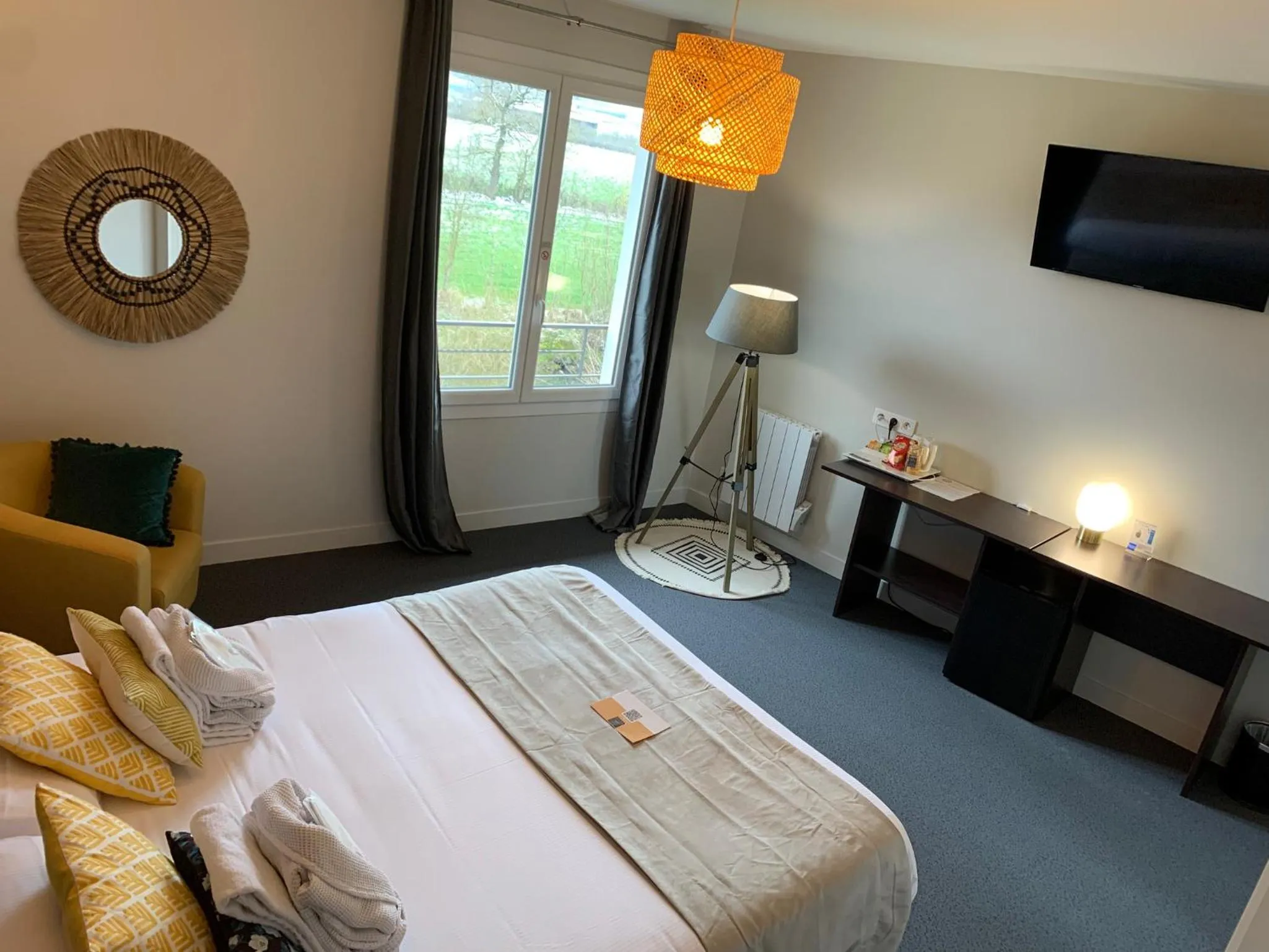 Photo of the whole room, Bed in Logis hôtel Aux Berges de l'Aveyron