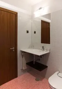 Bathroom in Hotel Millan