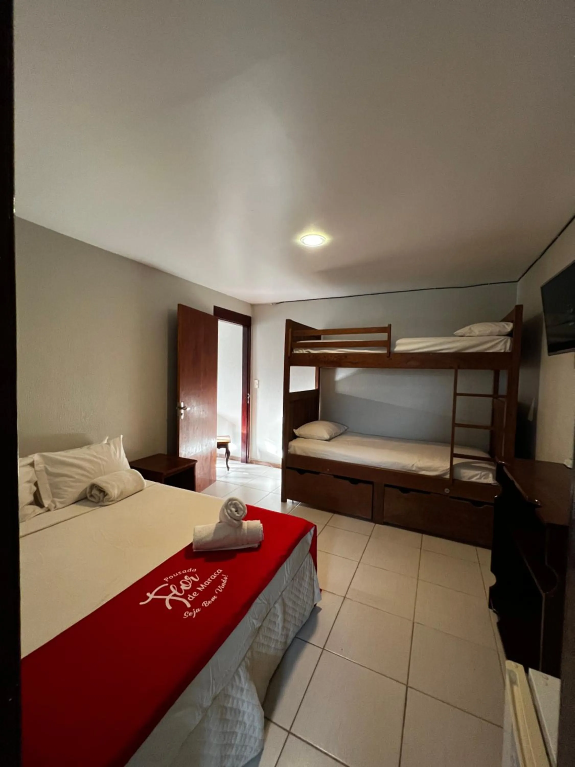 Bed in Pousada Flor de Maraca