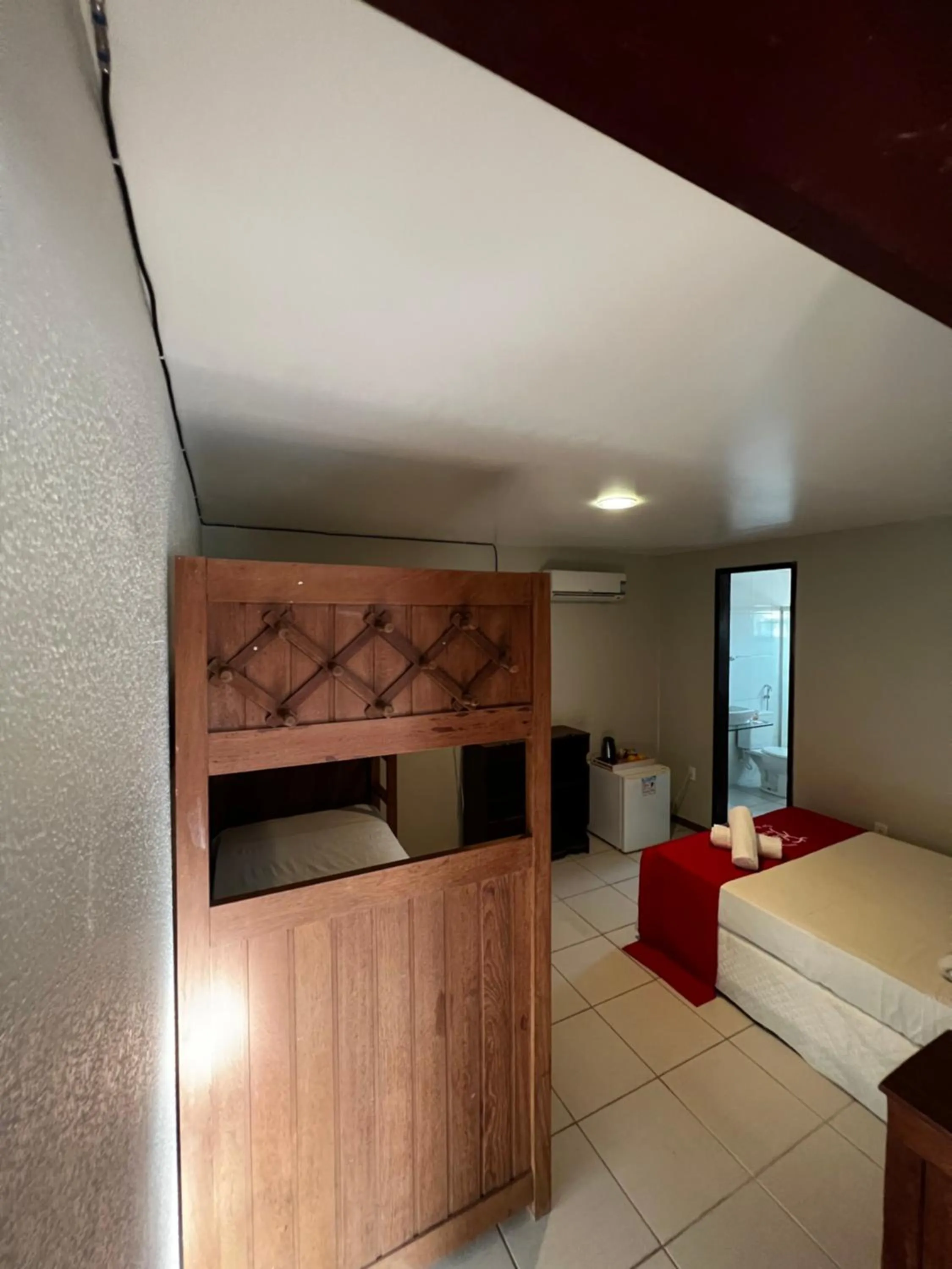 Bed in Pousada Flor de Maraca