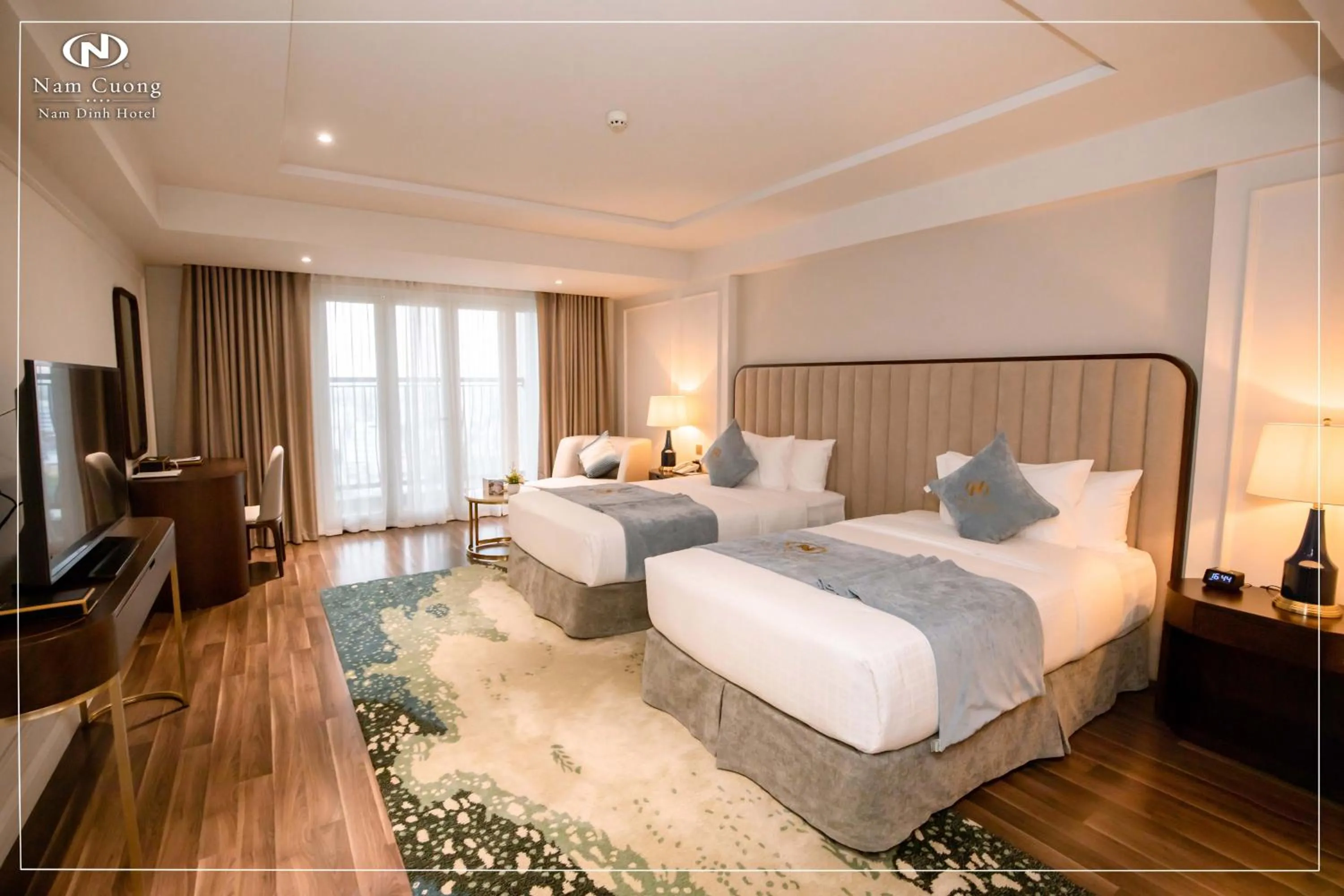 Bed in Nam Cuong Nam Dinh Hotel