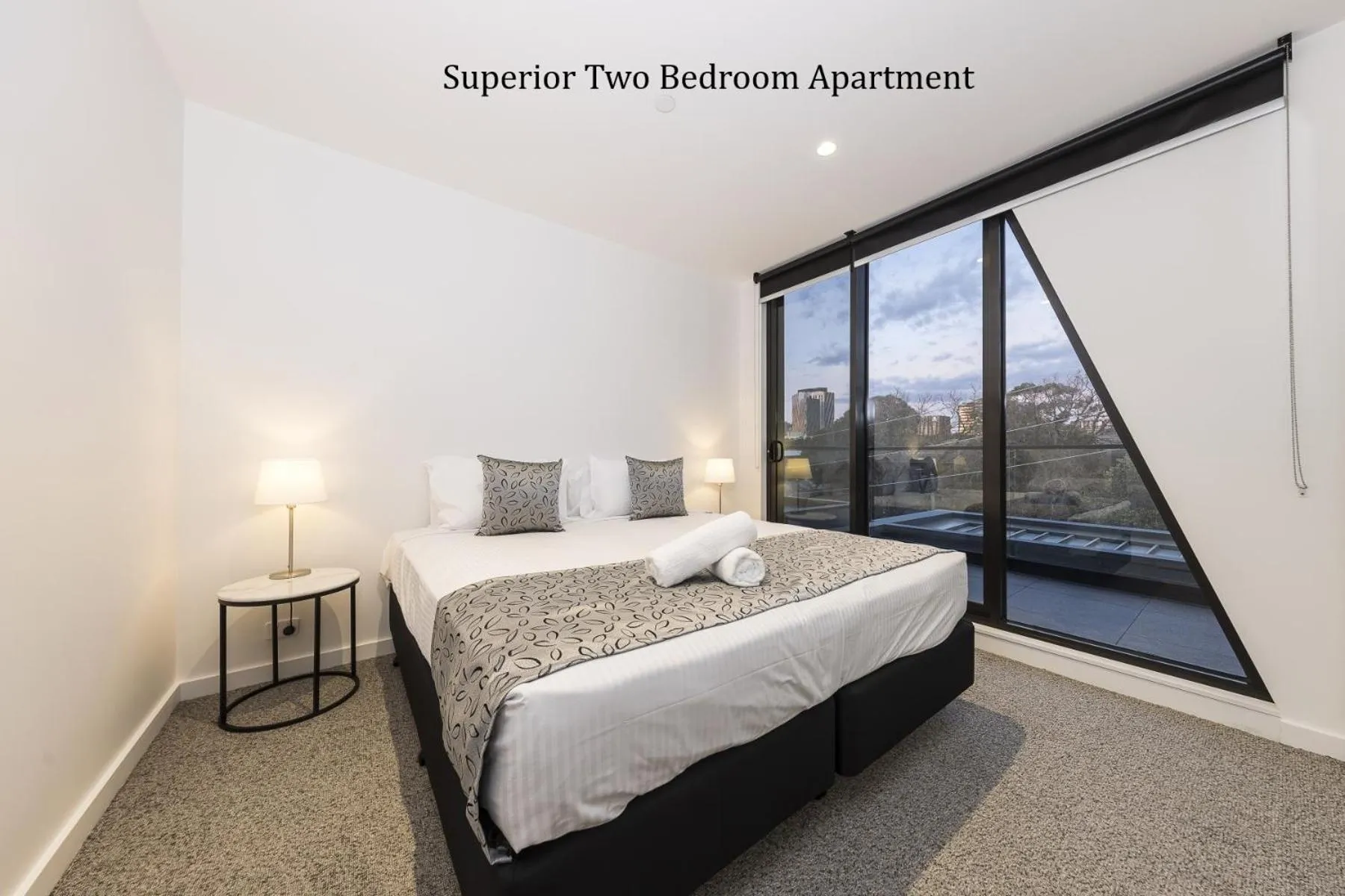 Bed in Q Squared Serviced Apartments