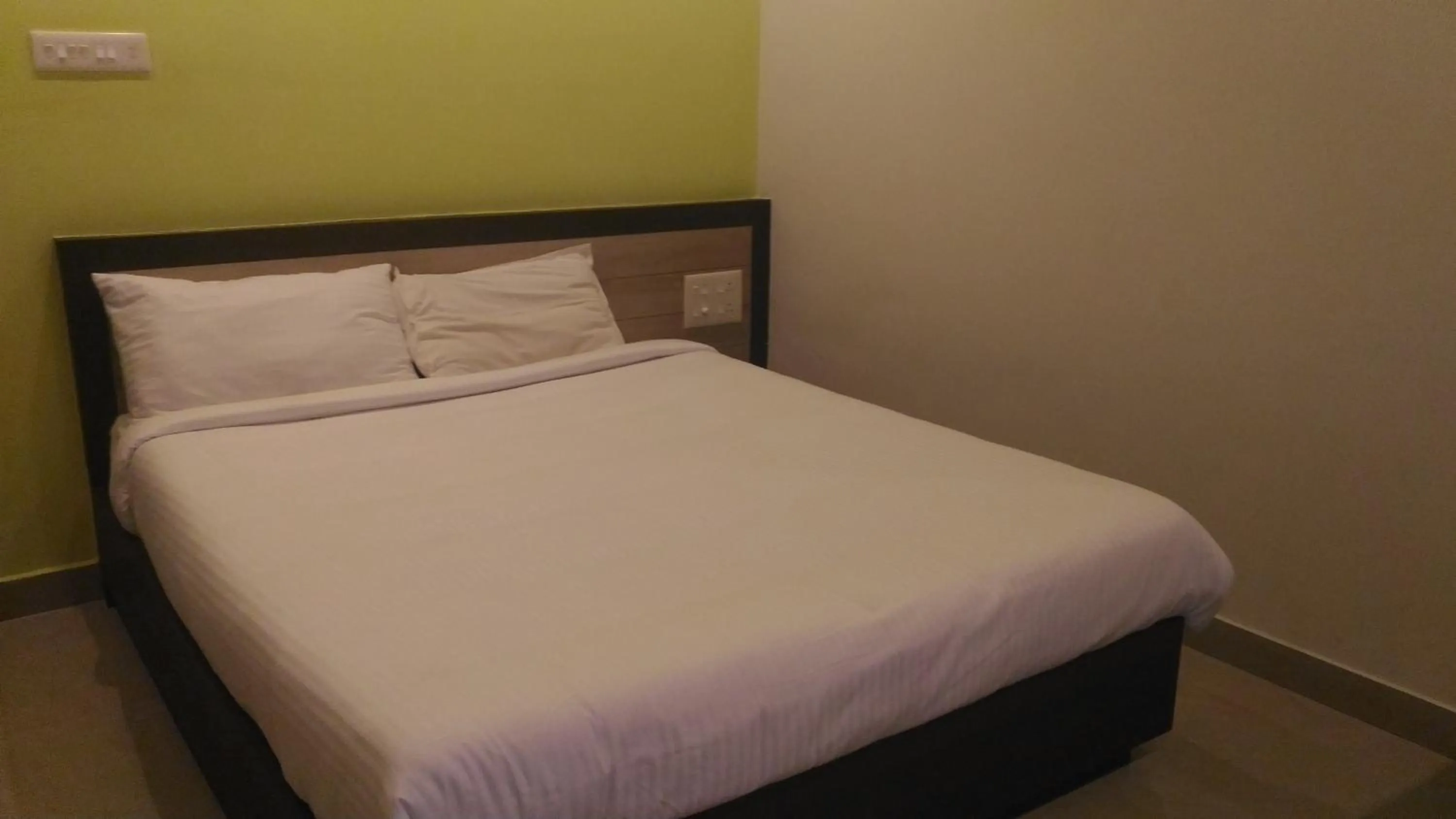 Bed in The Orchid Suites