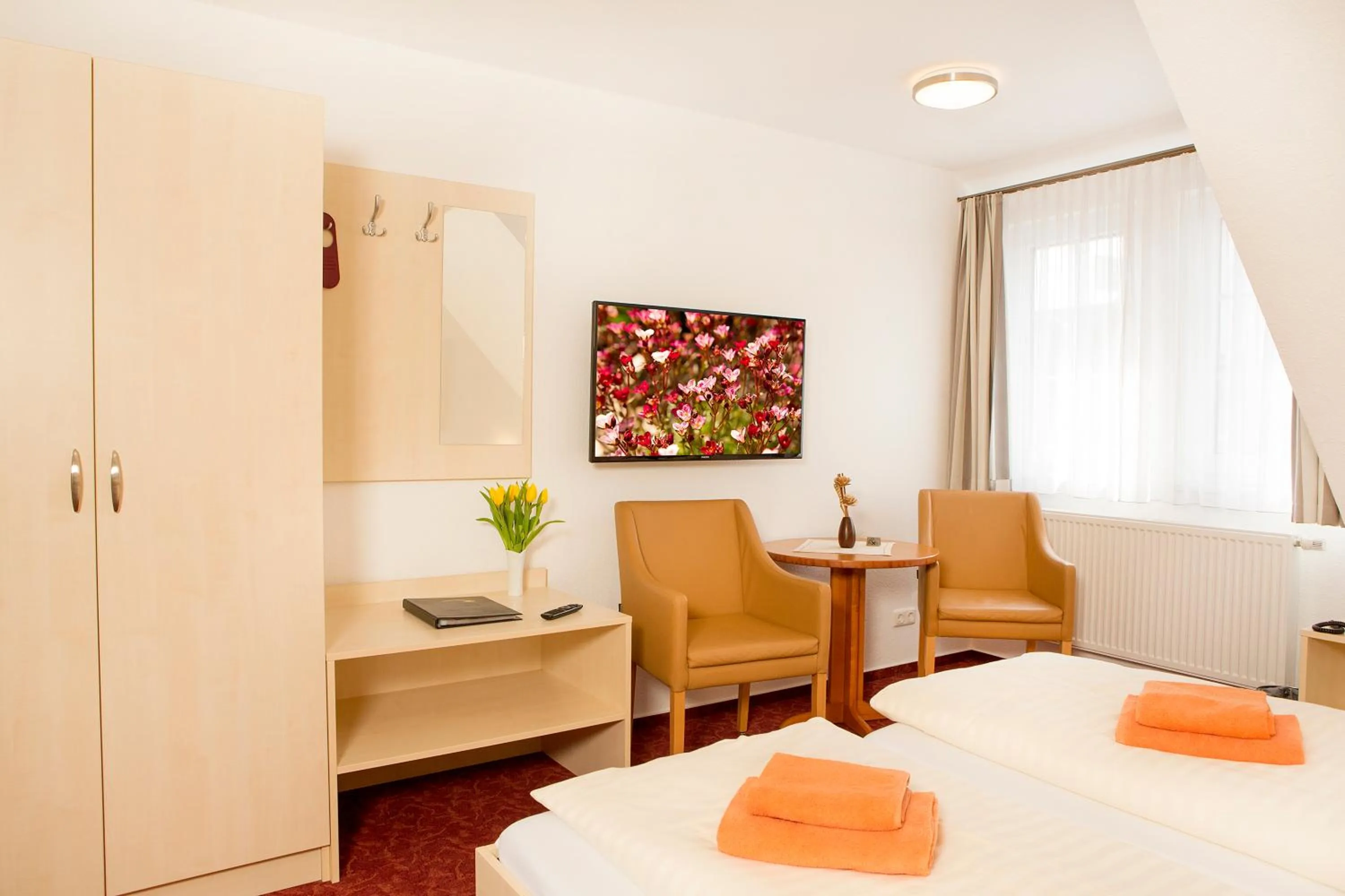 Seating area, Bed in Ferienhotel Bernstein