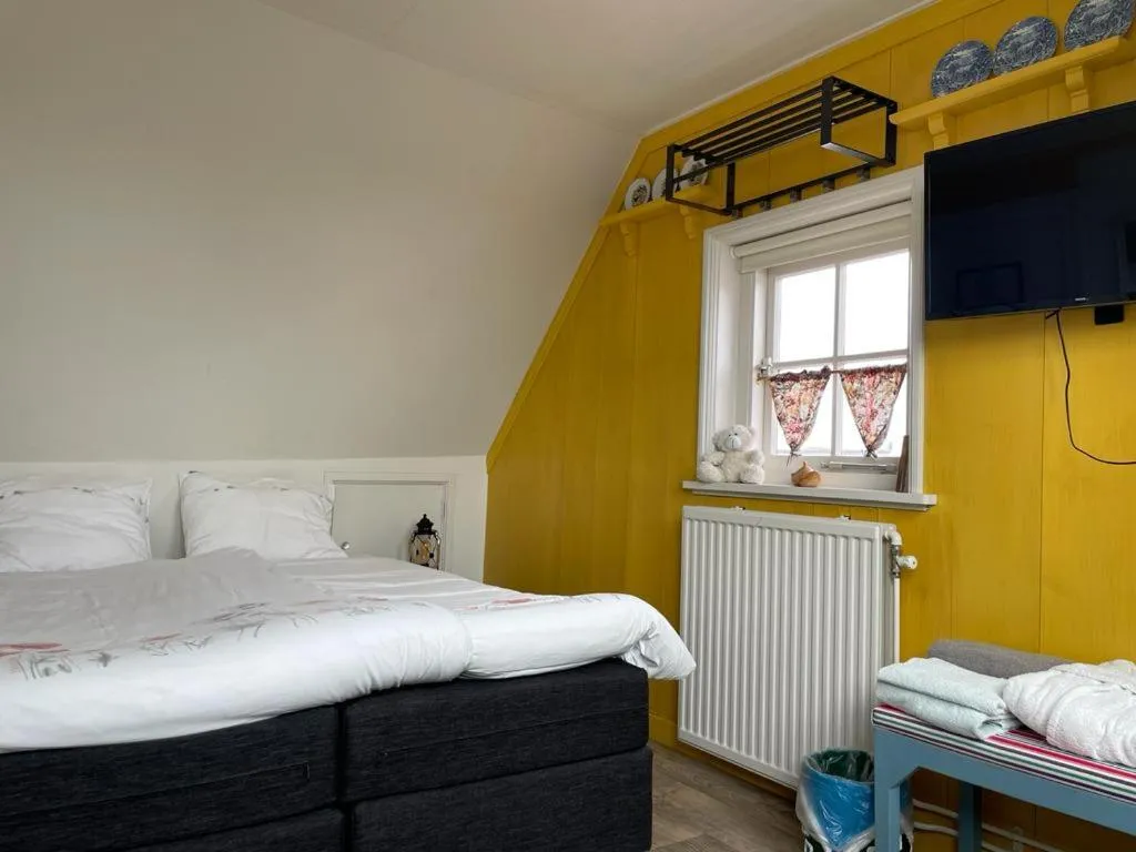 Bed in Bed and Breakfast De Pepersteeg
