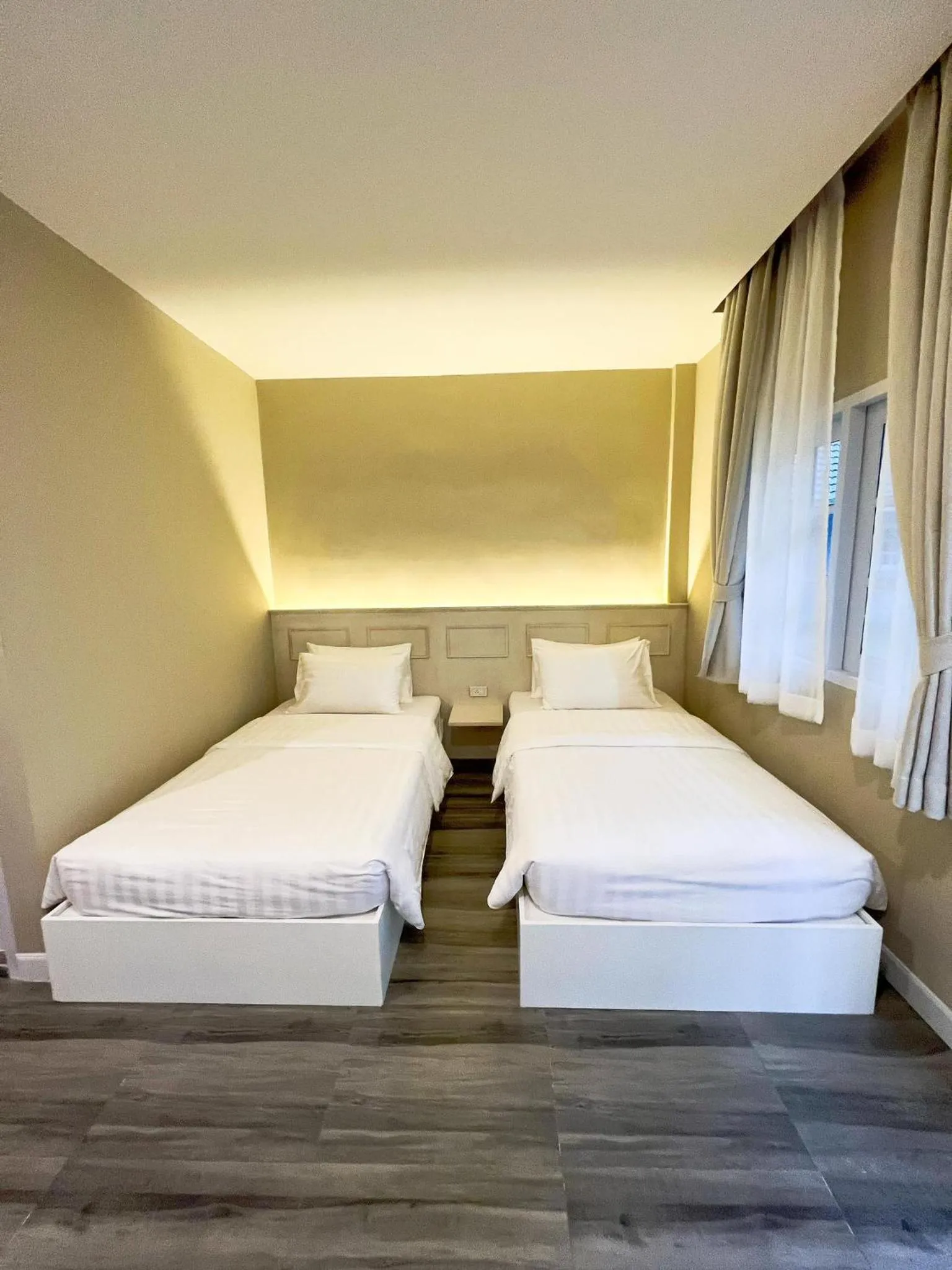 Bed in Srikij GardenHome Resort