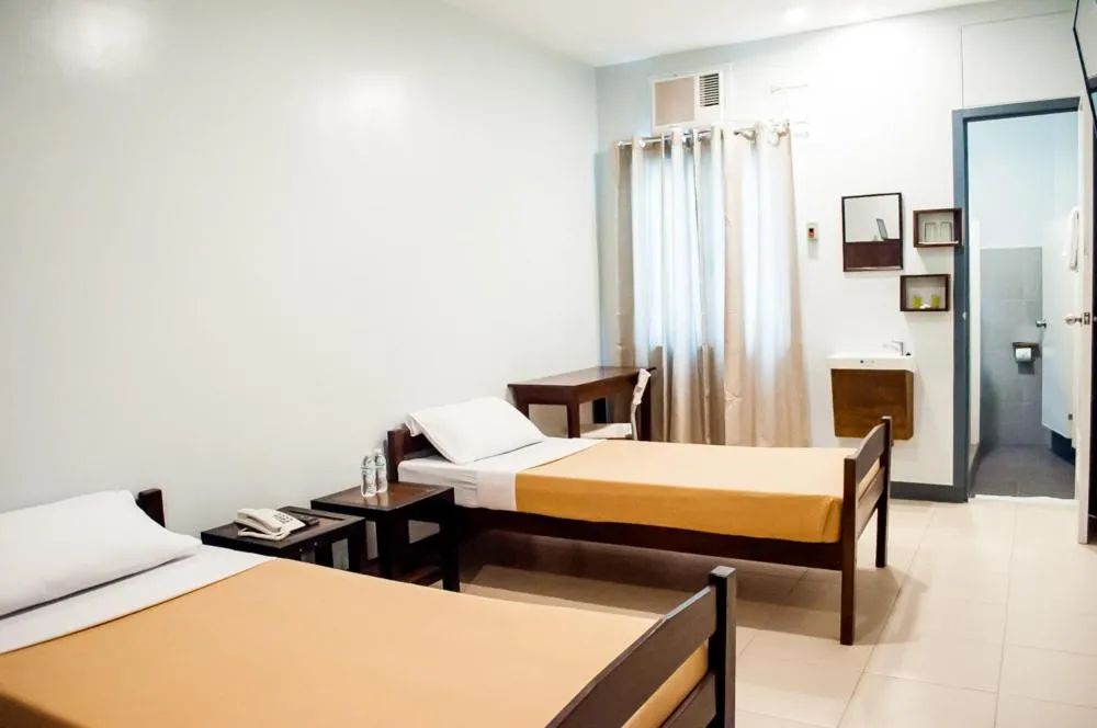 Photo of the whole room, Bed in Seasons Hotel Sablayan