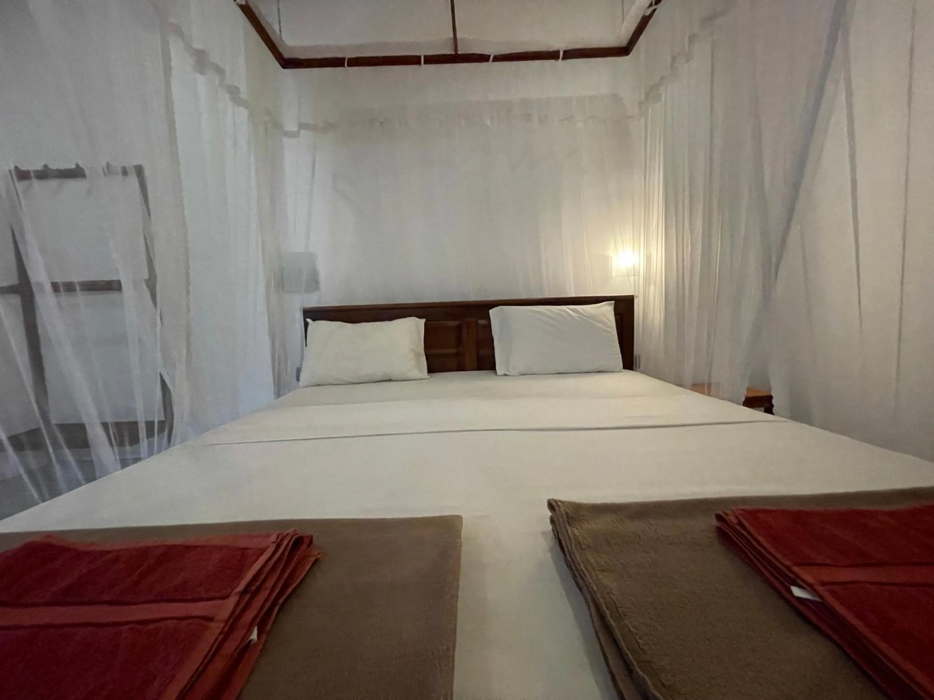Bed in Jade Green Rest Inn