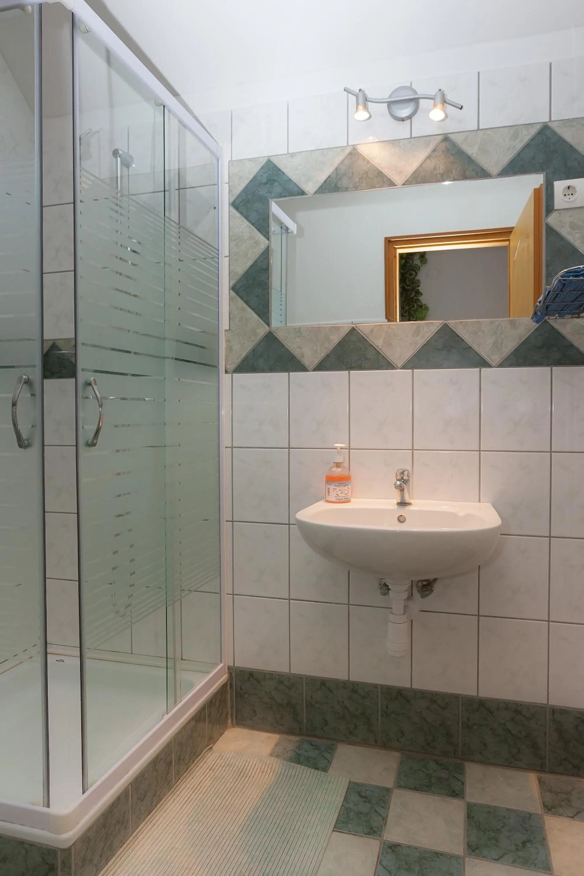 Bathroom in Páratlan Apartmanház