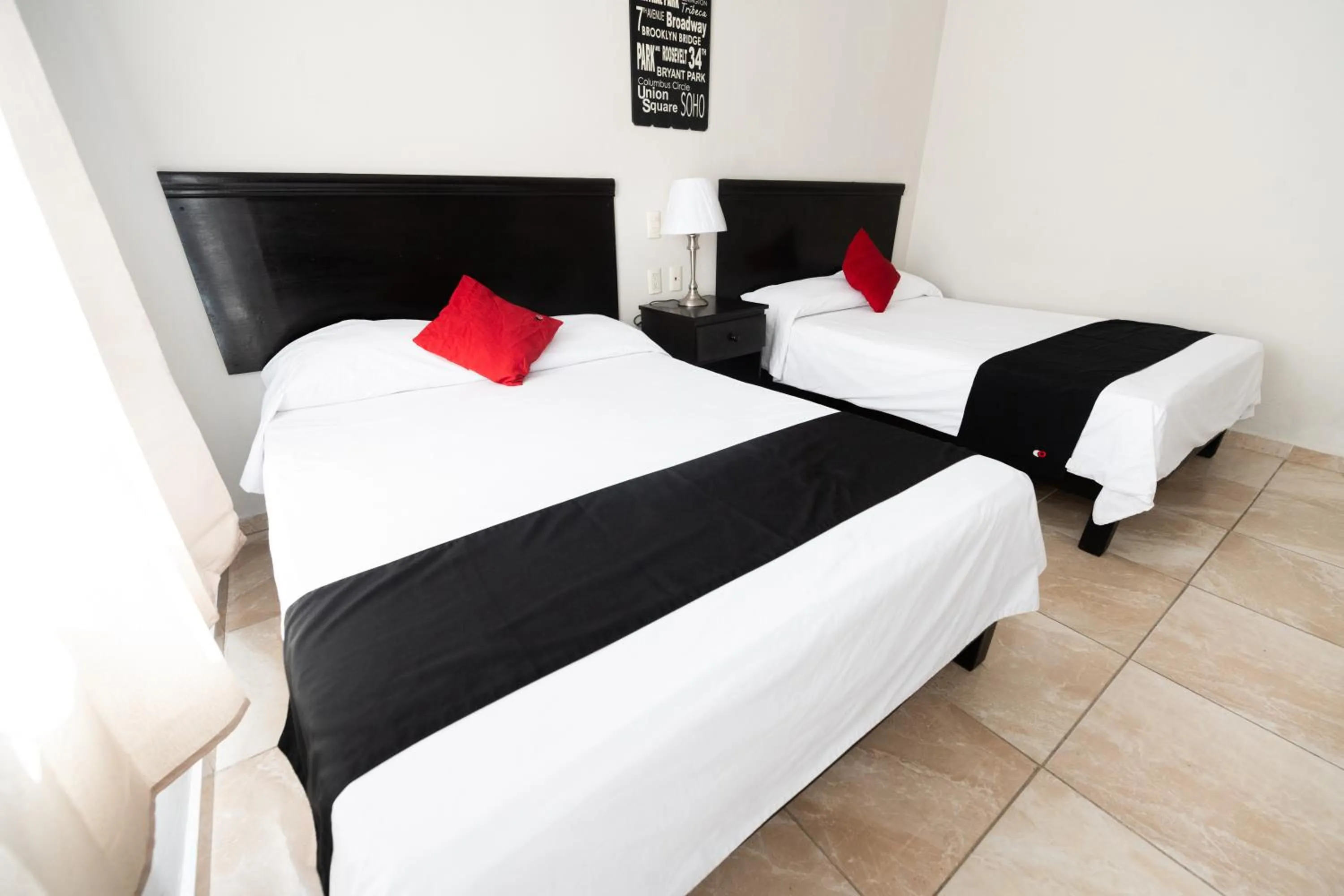 Photo of the whole room, Bed in Boca Inn Hotel & Suites