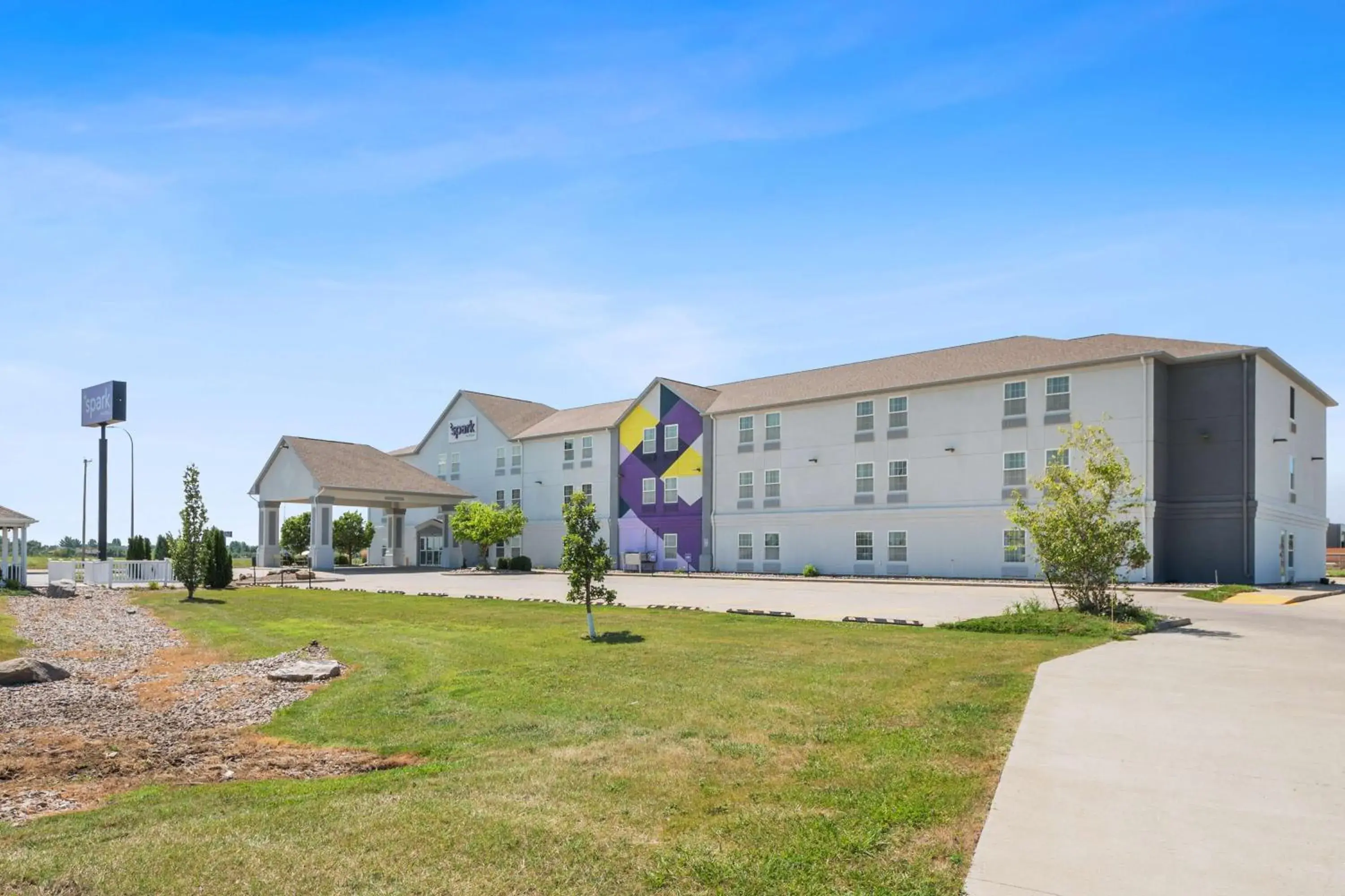 Property building in Spark by Hilton Minot Property building in Spark by Hilton Minot