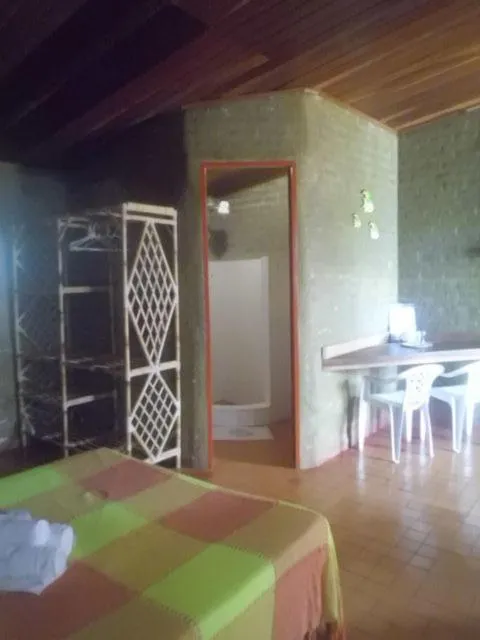 Bed in Chalemar Hotel Pousada