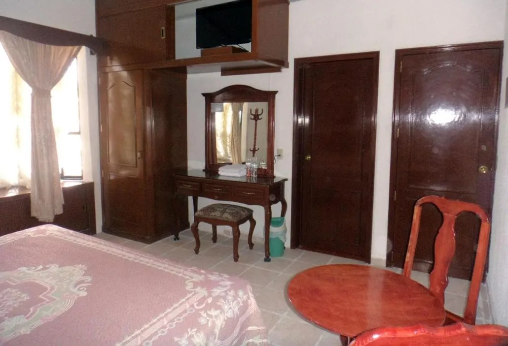 Bed in Hotel Don Porfirio