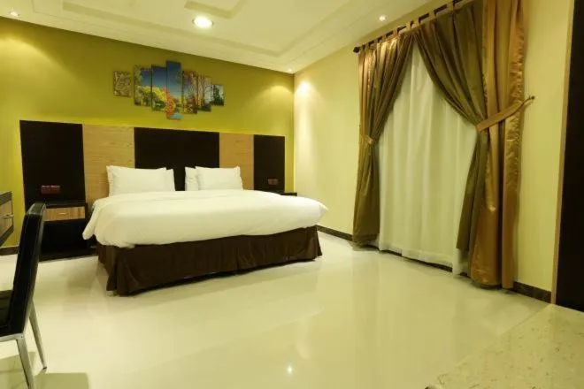 Bedroom, Bed in شقق توليب الروضه للشقق المخدومة