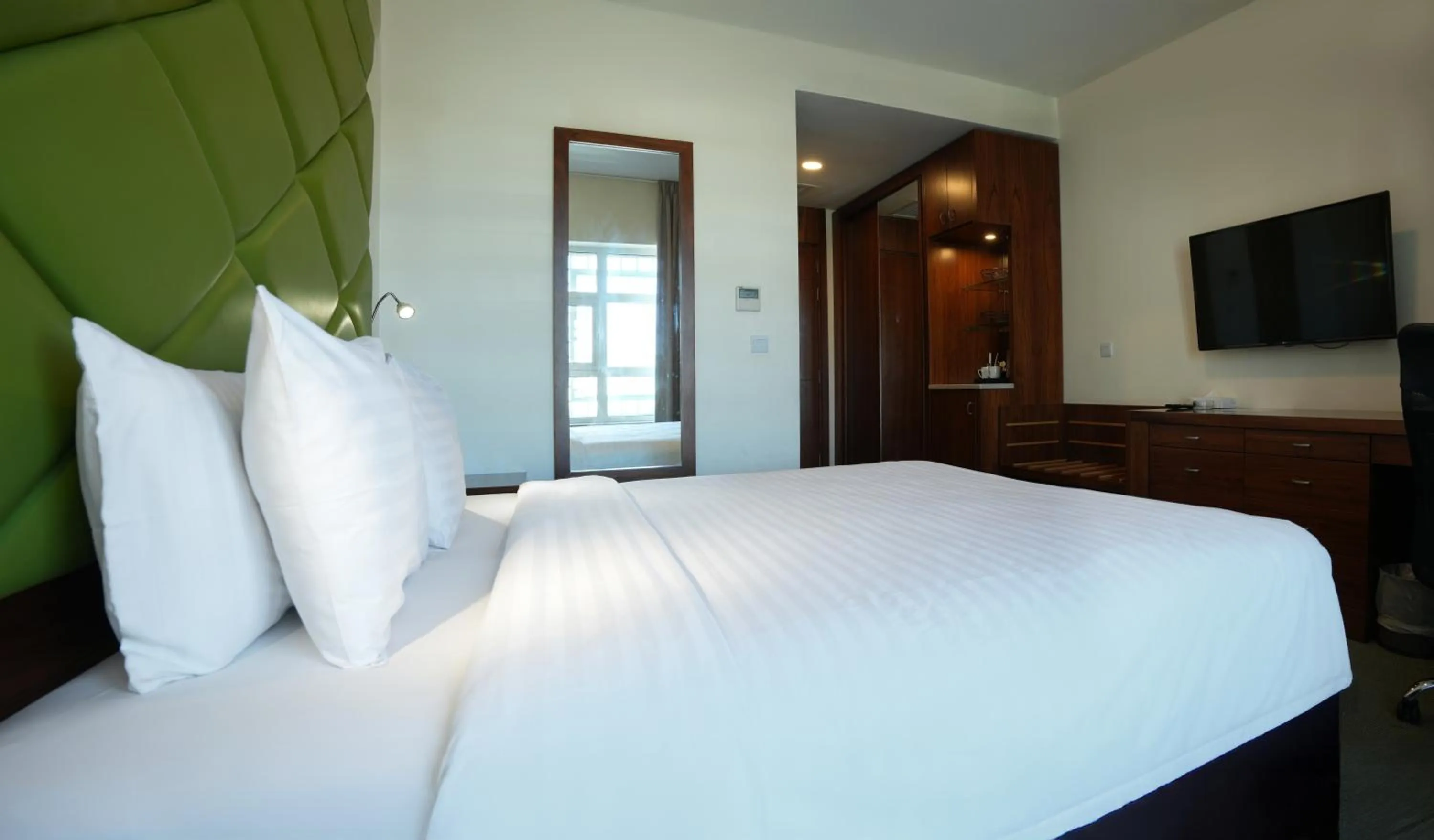 Bed in Holyland Hotel Amman