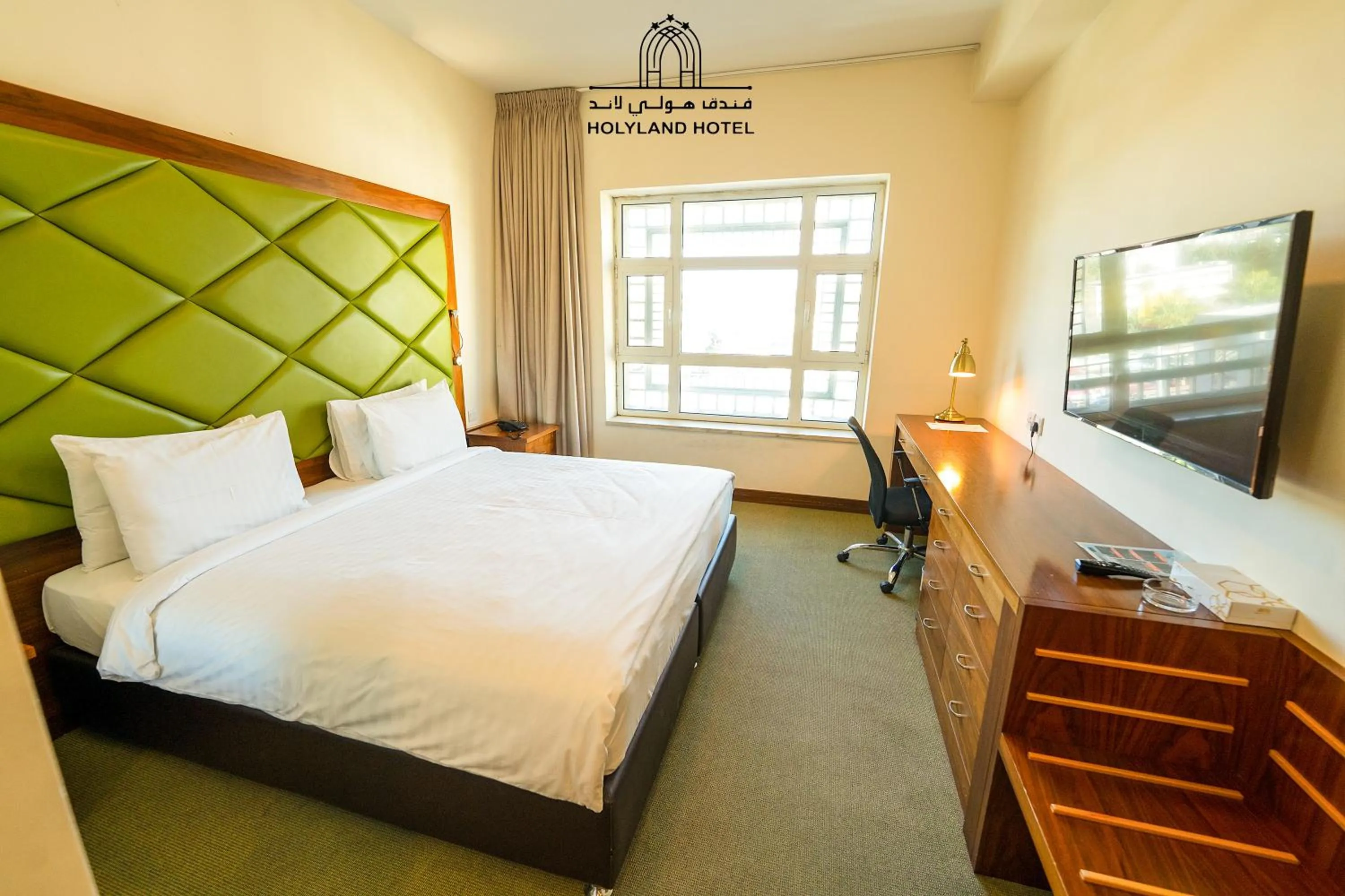 Bed in Holyland Hotel Amman