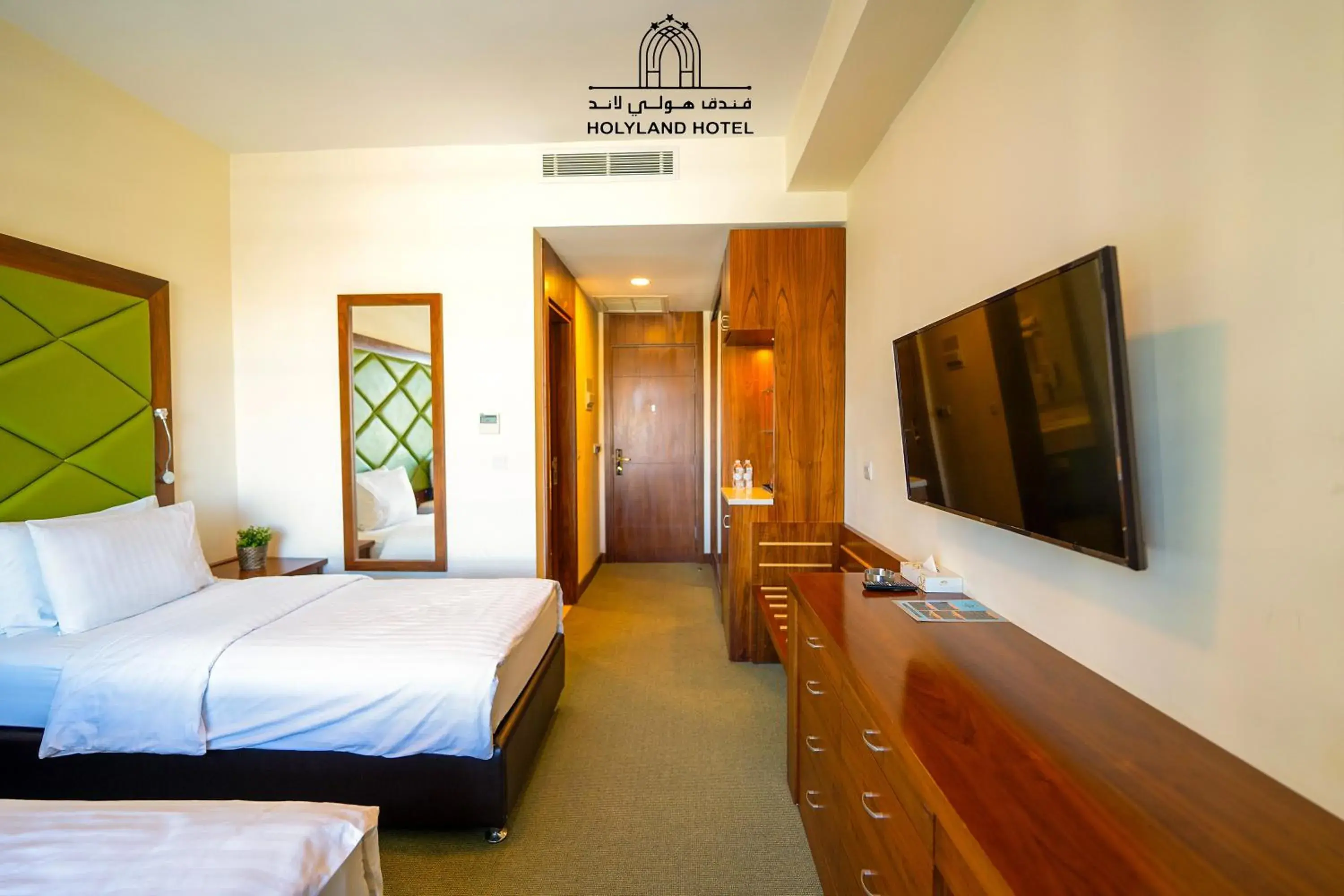 Deluxe Room (2 Adults + 1 Child) in Holyland Hotel Amman Deluxe Room (2 Adults + 1 Child) in Holyland Hotel Amman