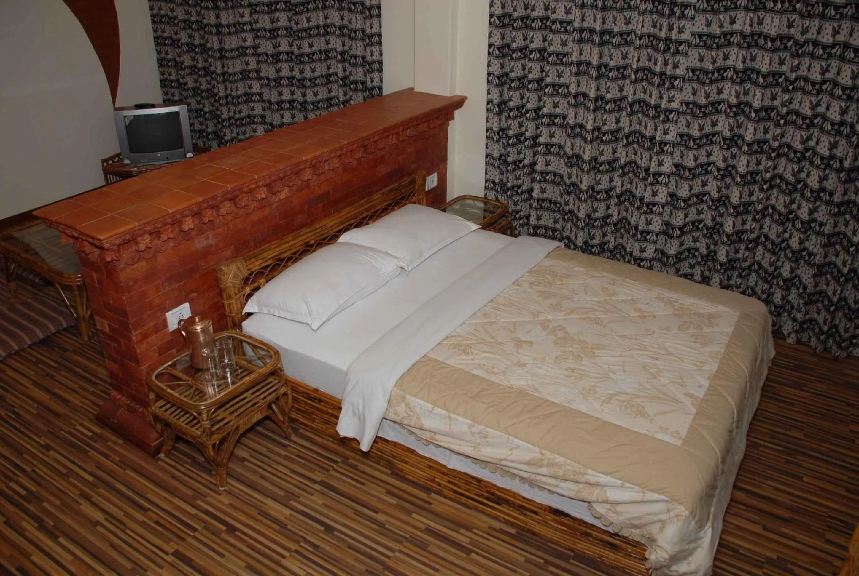 Bed in Vardan Resort n' Apartment