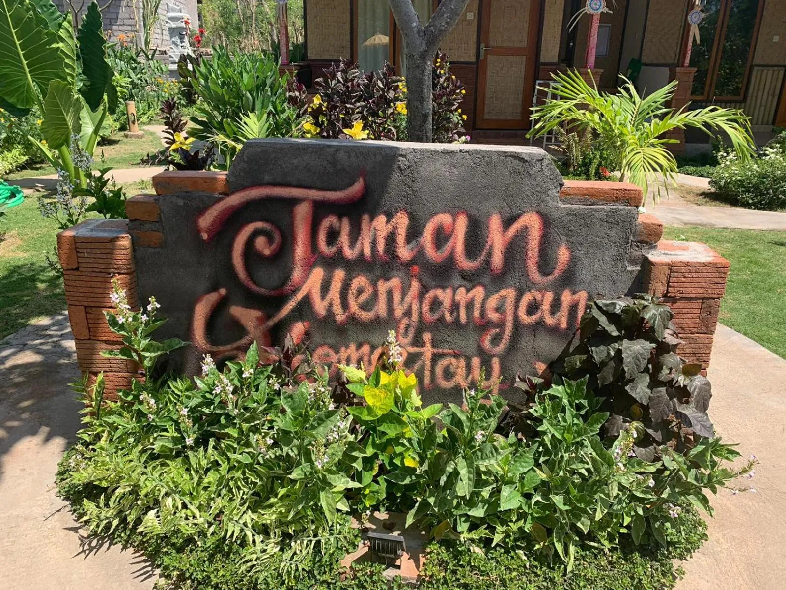 Property logo or sign in Taman Menjangan homestay by SnorkelingMenjangan