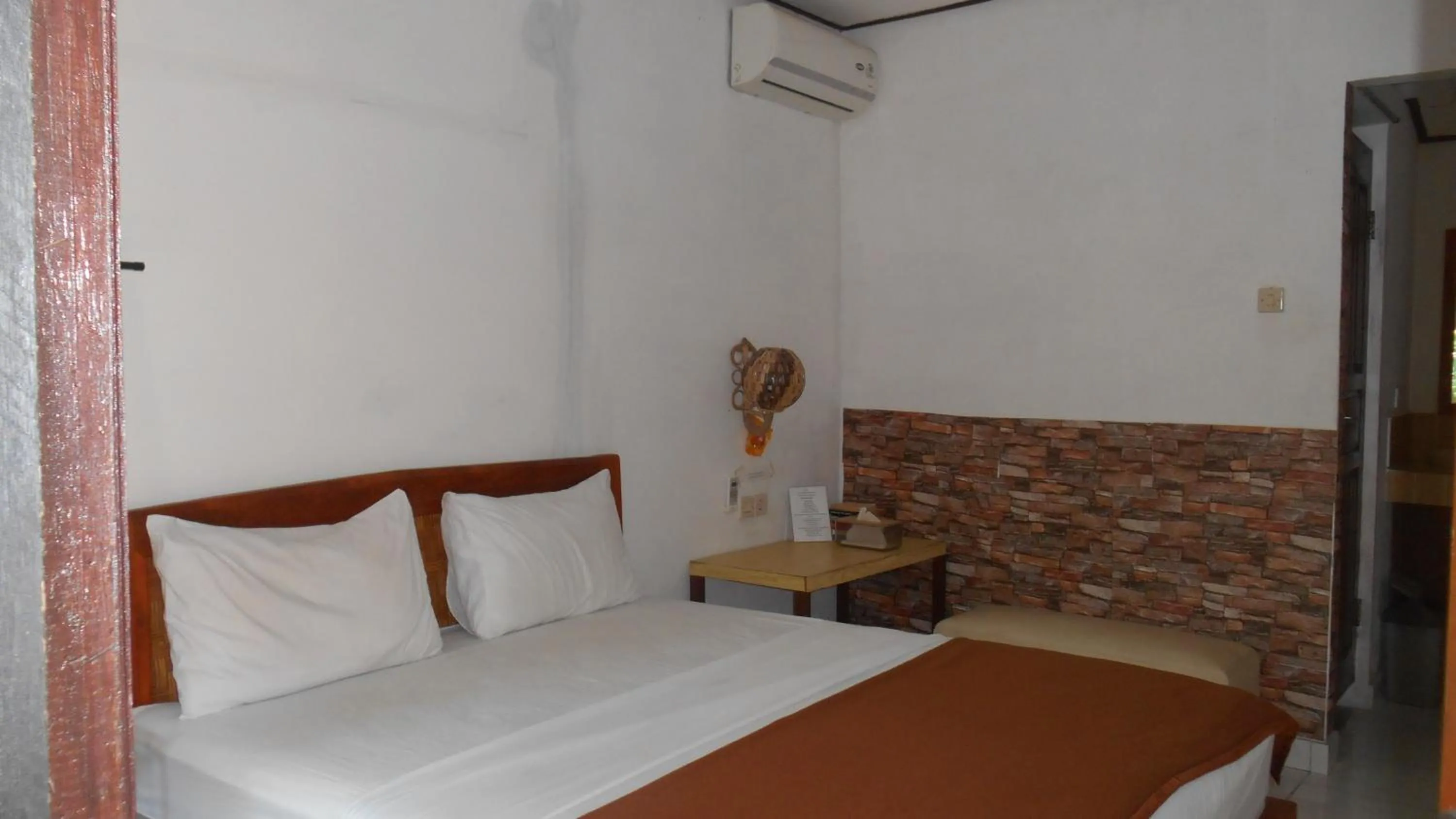 Bedroom, Bed in Taman Menjangan homestay by SnorkelingMenjangan