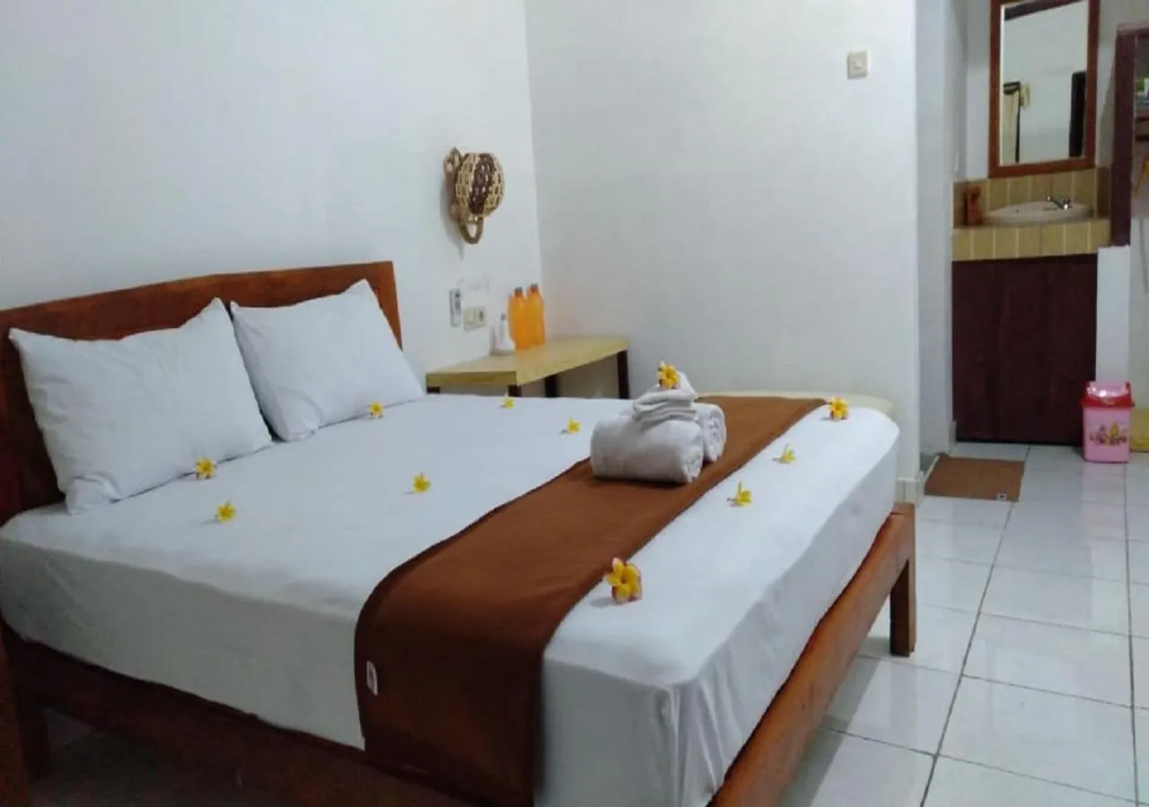 Seating area, Bed in Taman Menjangan homestay by SnorkelingMenjangan