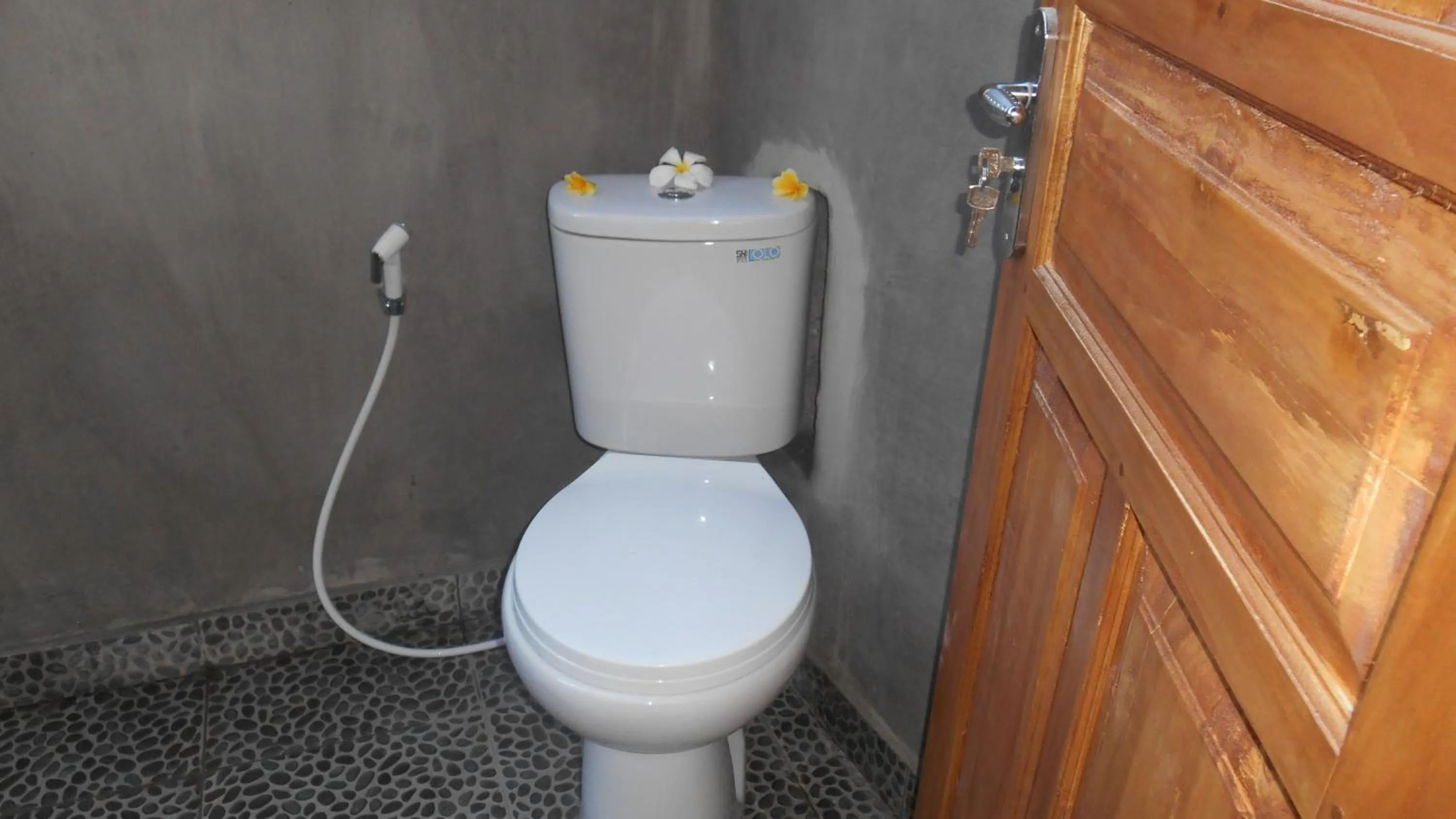 Toilet in Taman Menjangan homestay by SnorkelingMenjangan