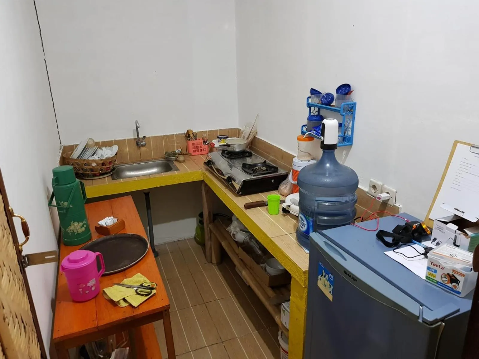 Kitchen or kitchenette in Taman Menjangan homestay by SnorkelingMenjangan