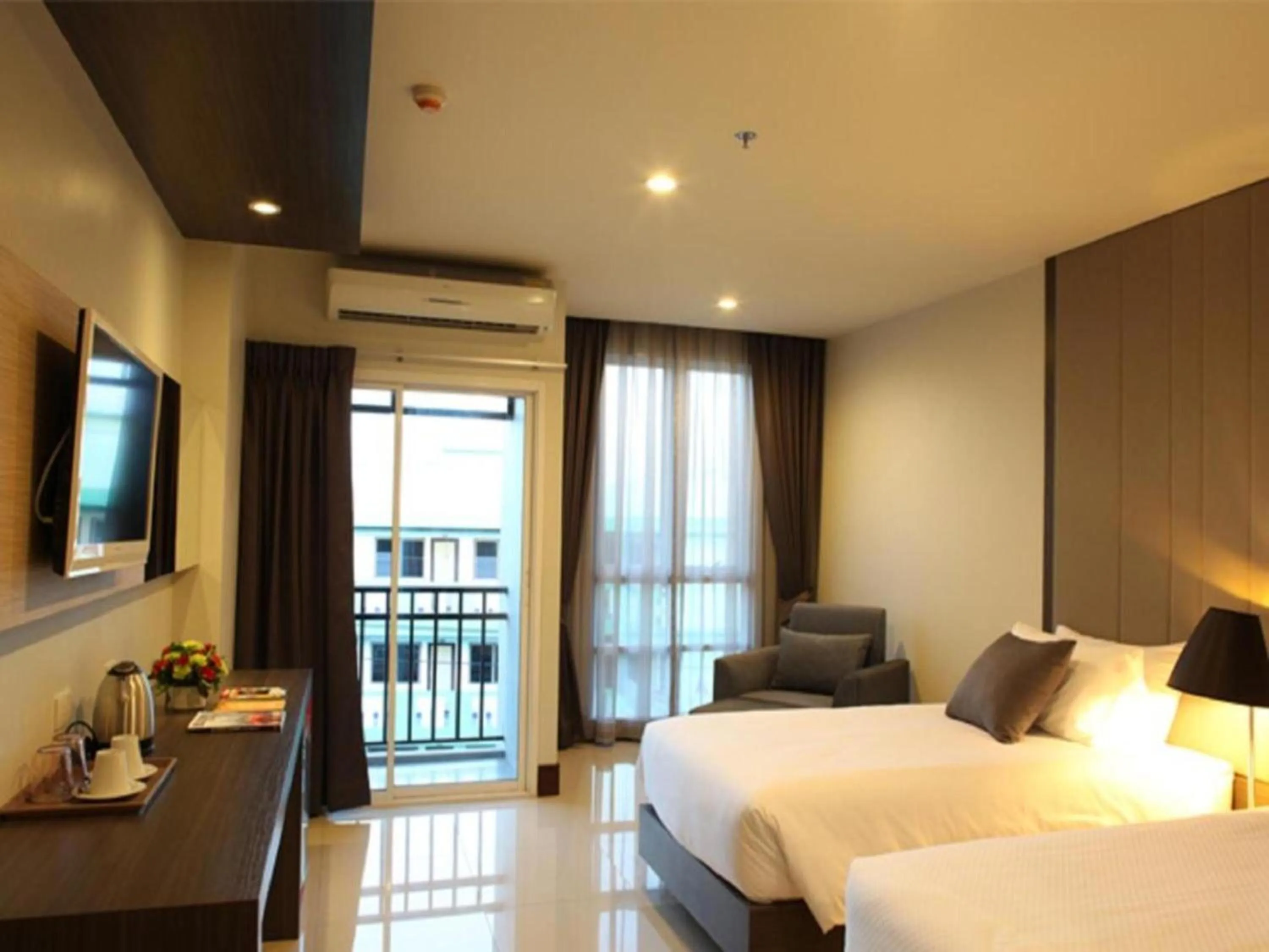 Photo of the whole room, Bed in Crystal Suites Suvarnbhumi Airport